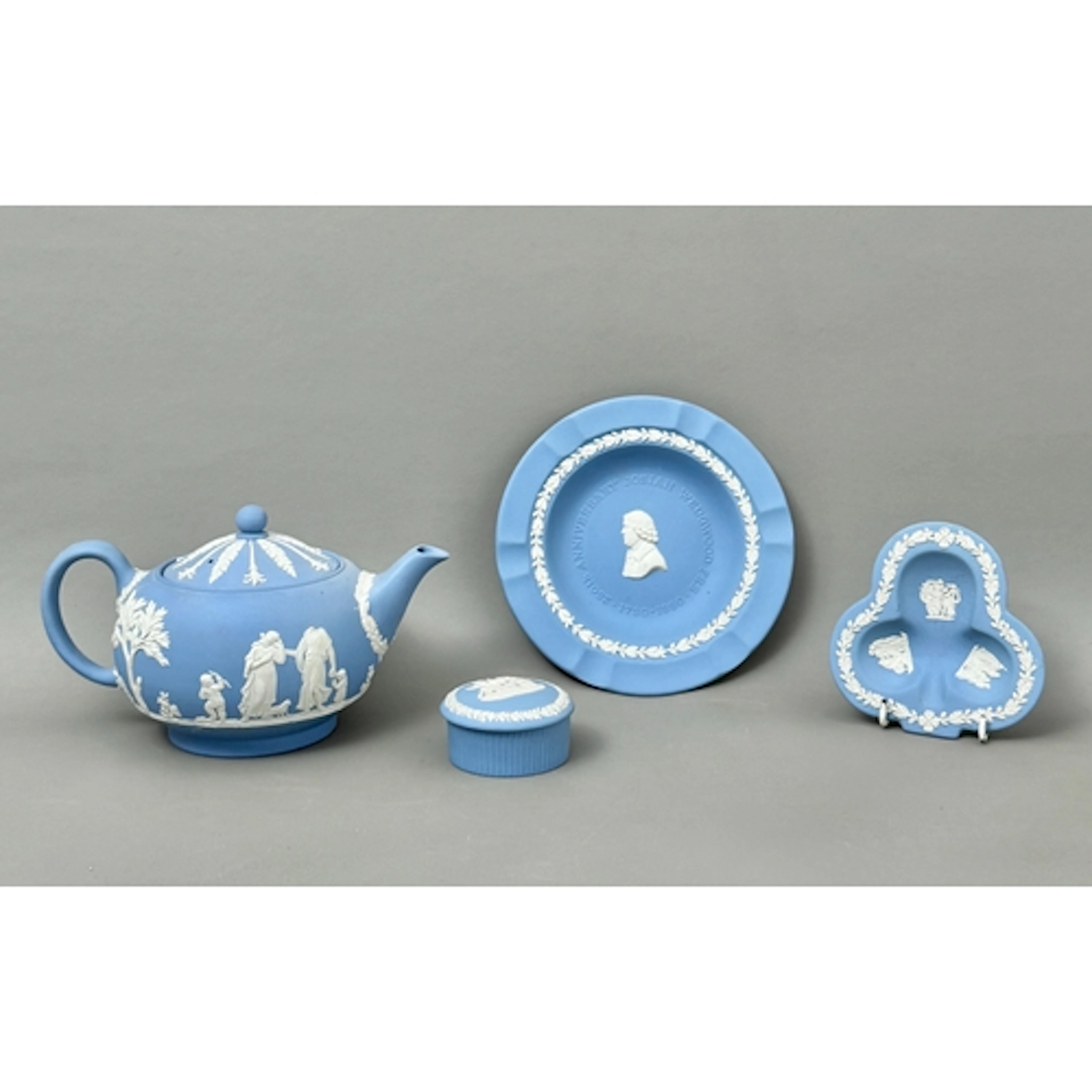 A Wedgwood Jasperware teapot - together with a covered trink...