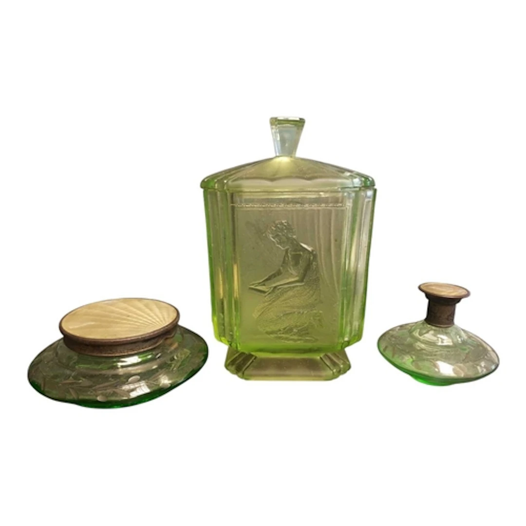 Three 20th century green Art Deco glass. To include a Sowerb...