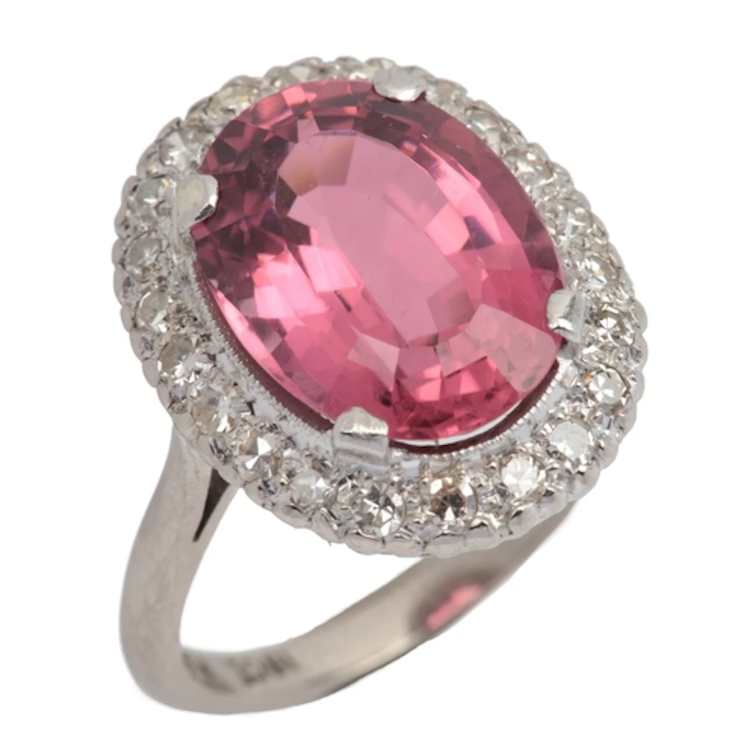 A pink tourmaline and diamond ring, of cluster design, set w...