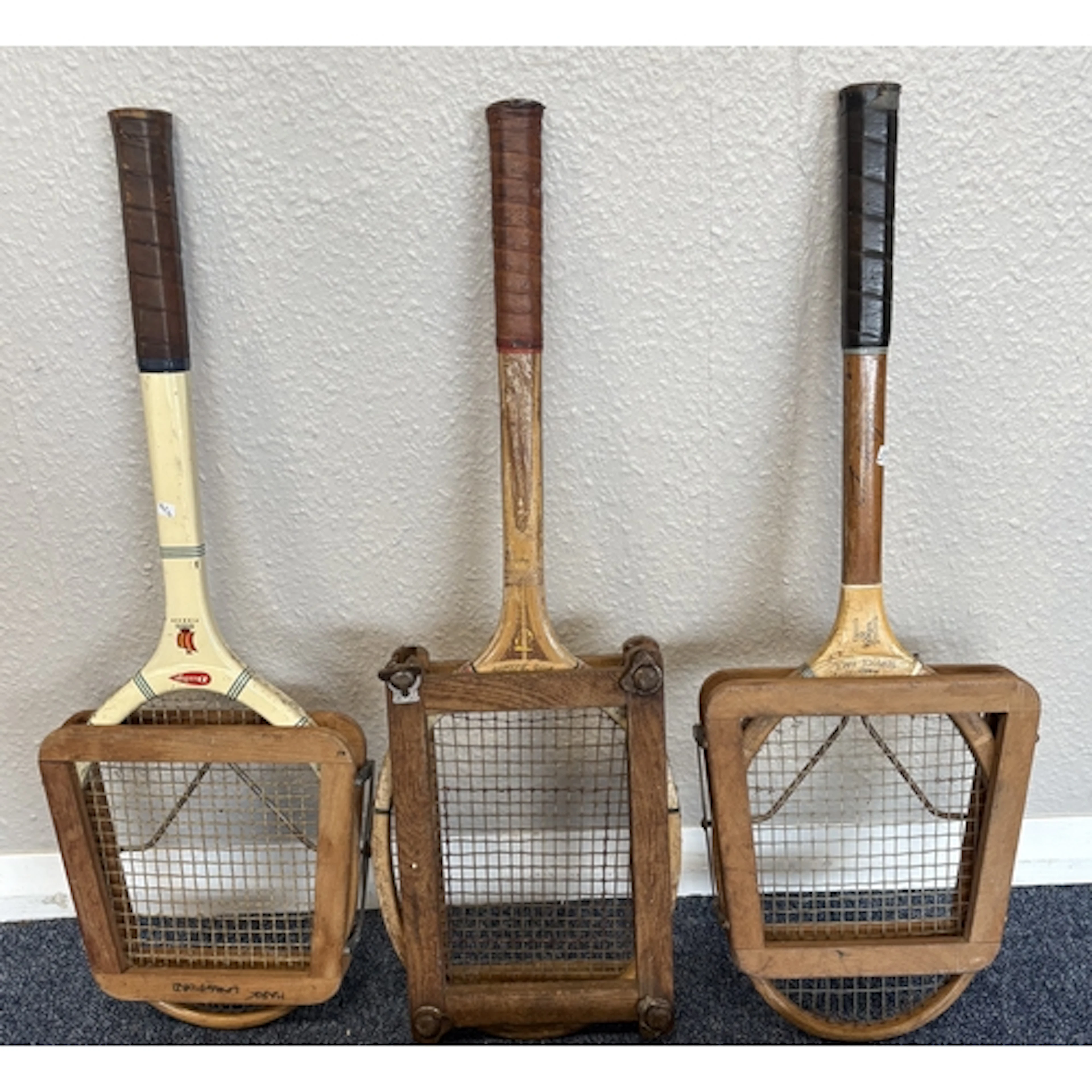 A vintage Slazenger PM tennis racket together with three oth...