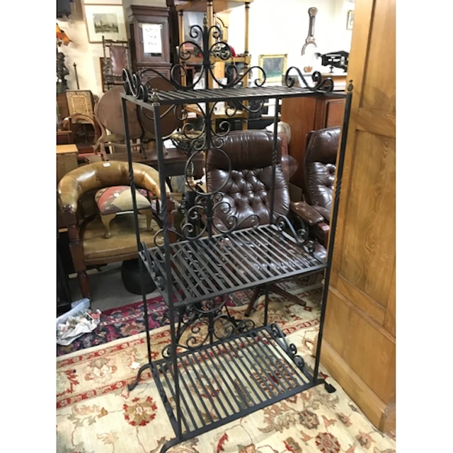 A wrought iron stand and one other stand. 156 and 112cm tall