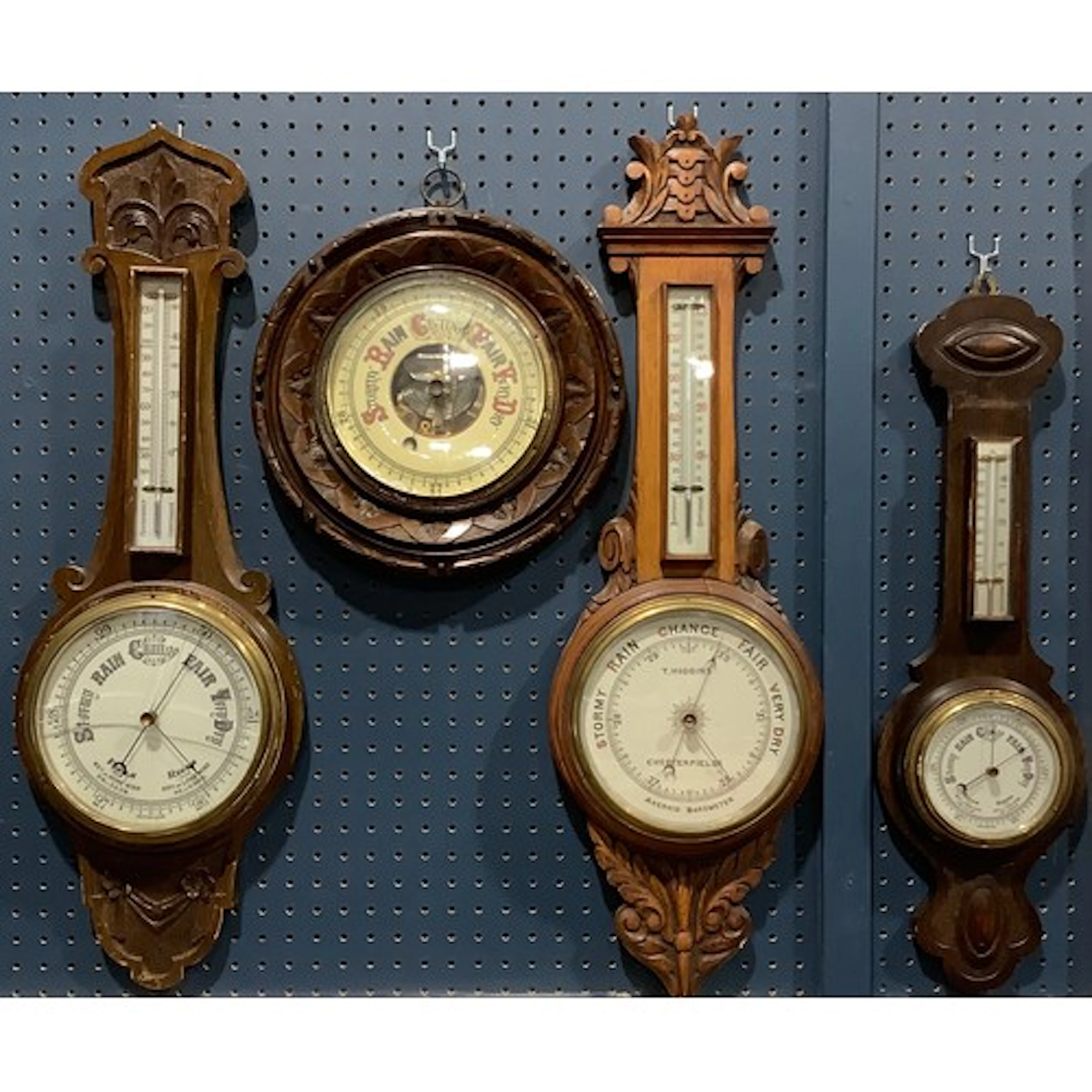 A late Victorian/Edwardian oak barometer, T. Higgins, Cheste...