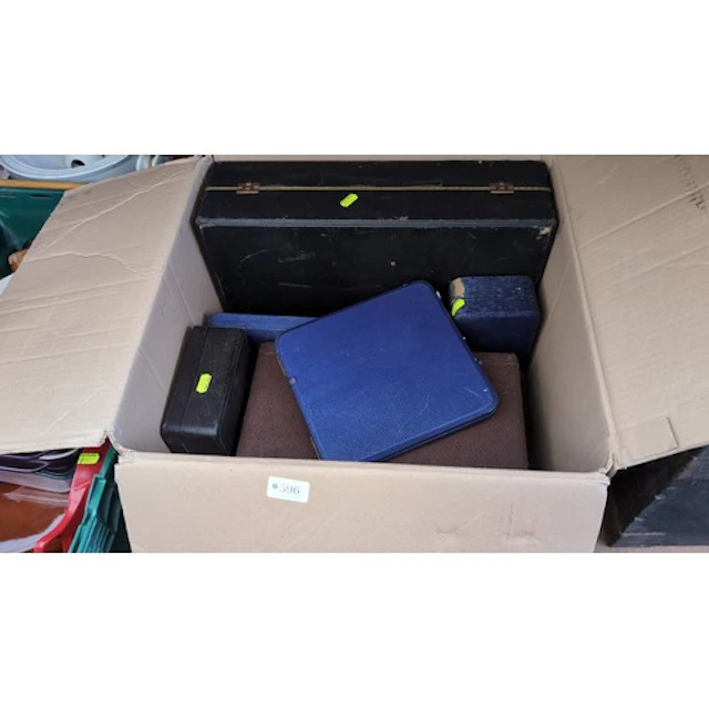A group of fitted cutlery presentation cases in blue, black ...