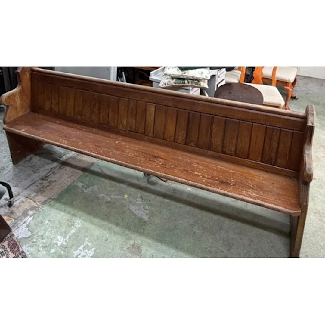 A Pine Church Pew / bench, a shaped end support, and bult in...