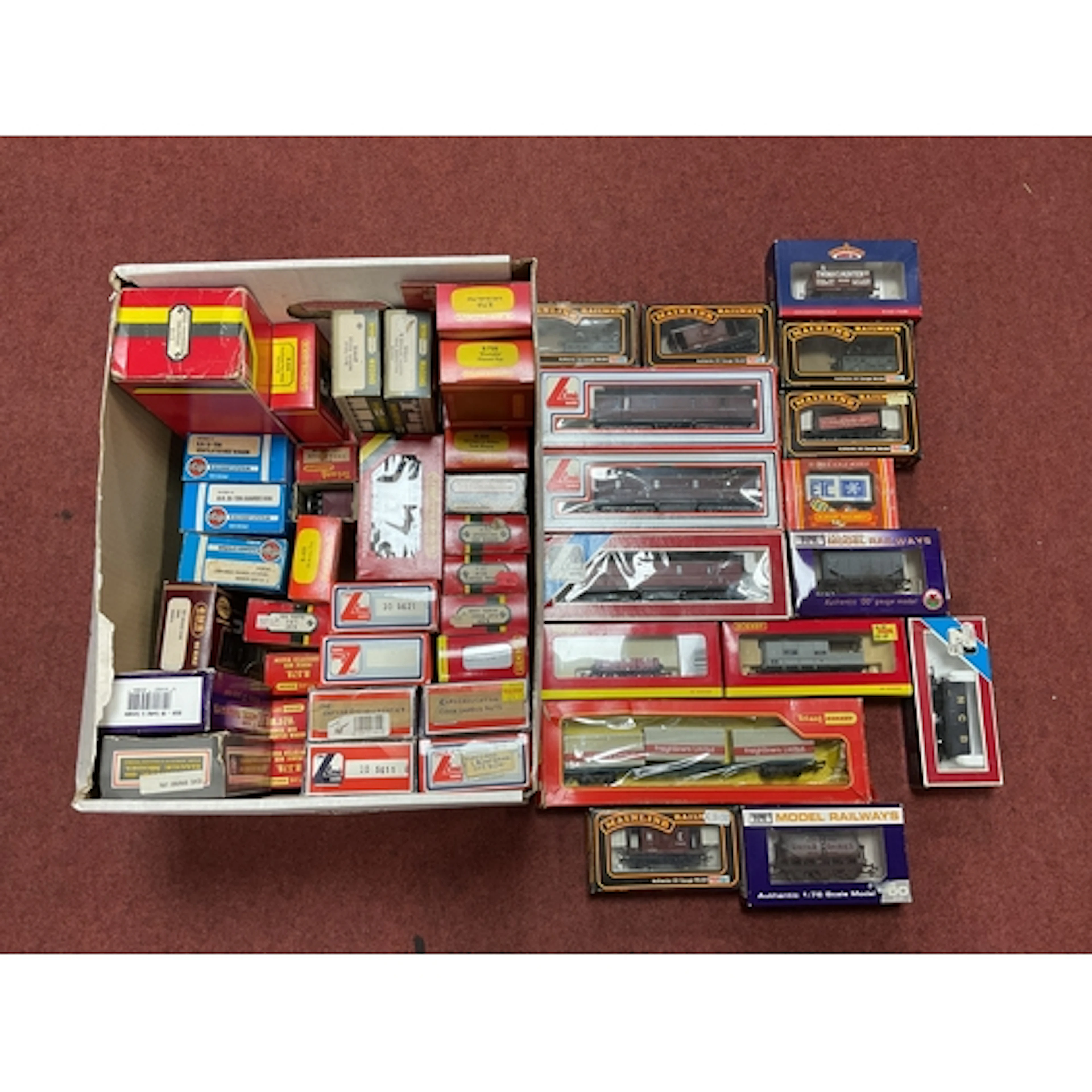 Approximately fifty-seven boxed 00 gauge wagons and brake va...