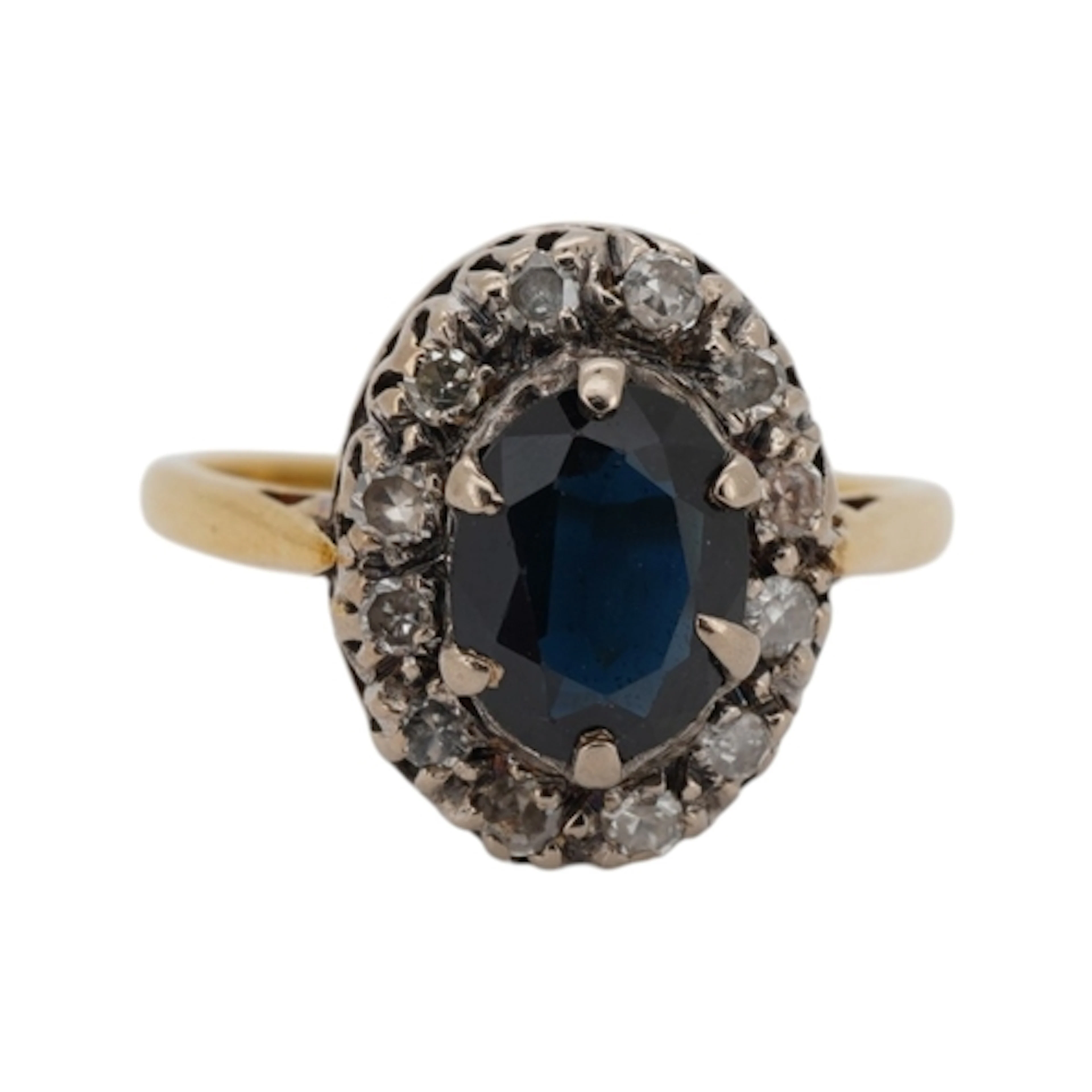 An 18ct, sapphire and diamond set oval cluster ring, size M,...