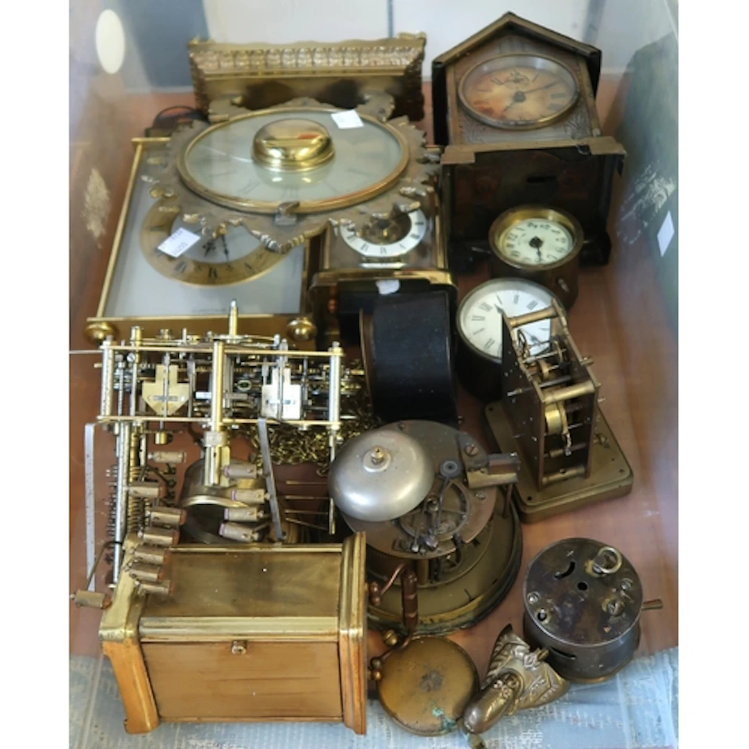 Miscellaneous brass cased clocks and movements, to include E...