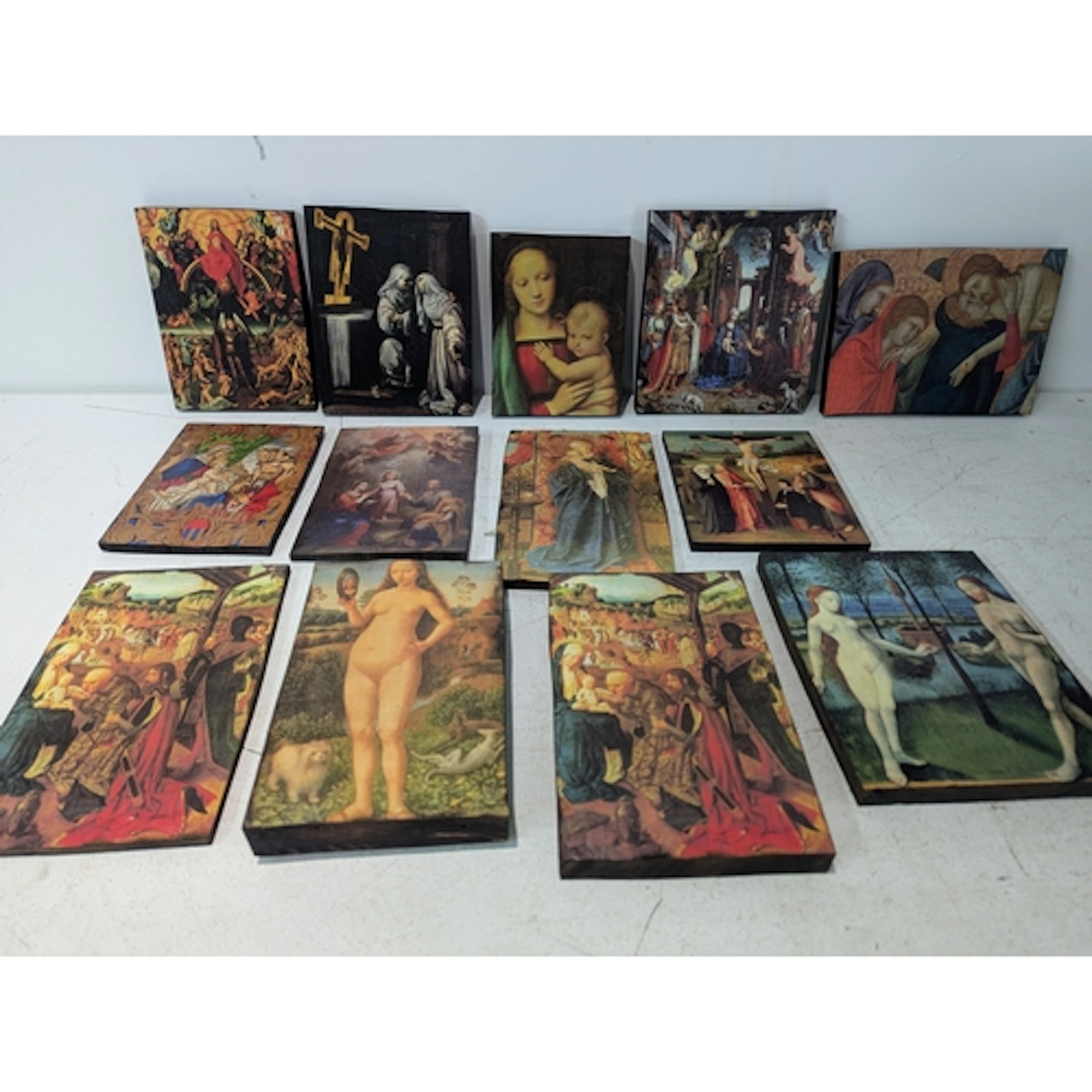 A group of Religious prints on wooden plaques Location: RAB ...