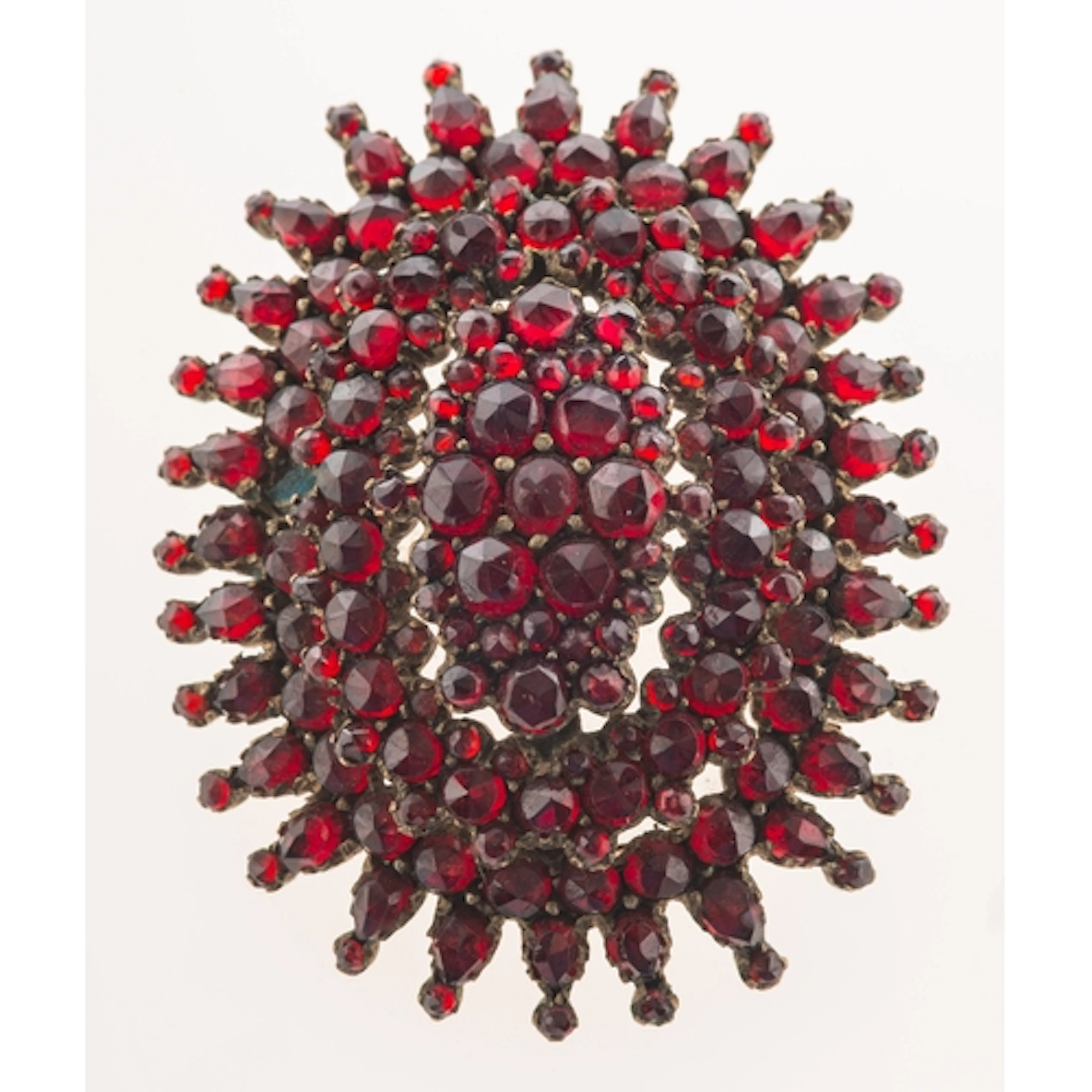 A Victorian Bohemian garnet keepsake pendant brooch, of oval...