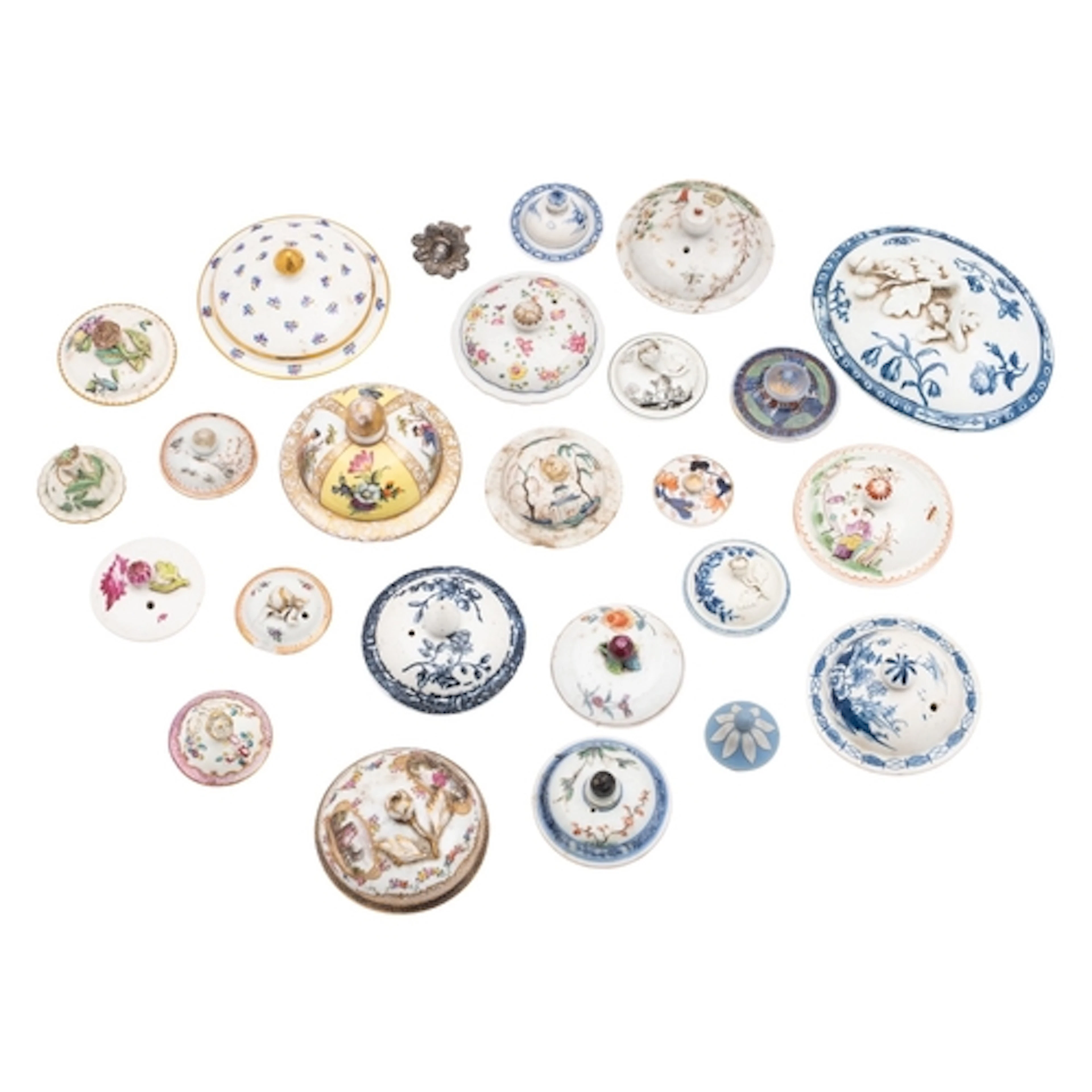 A collection of 18th and 19th century ceramic lids the major...