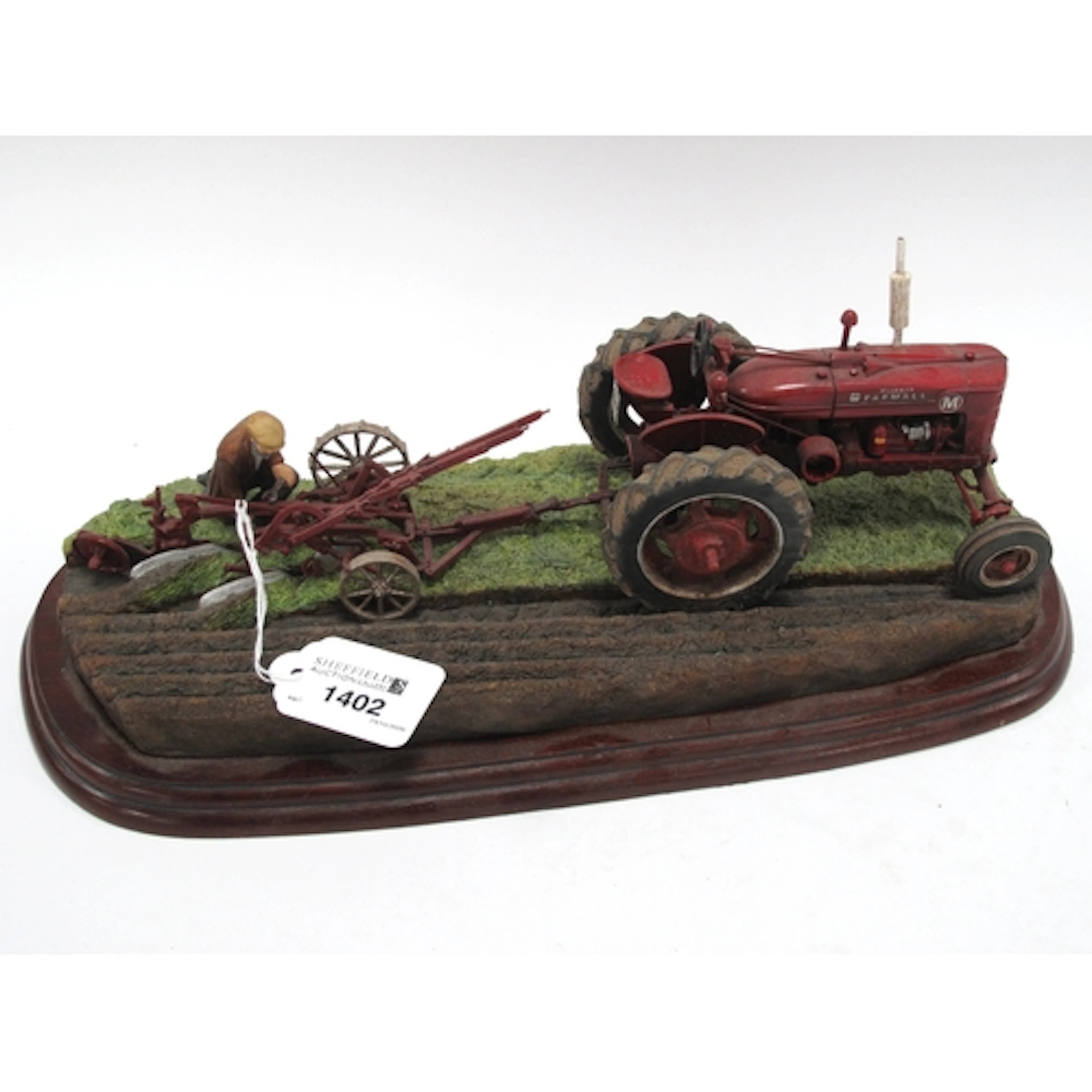 Border Fine Arts Tractors Making Adjustments, 32cm long.