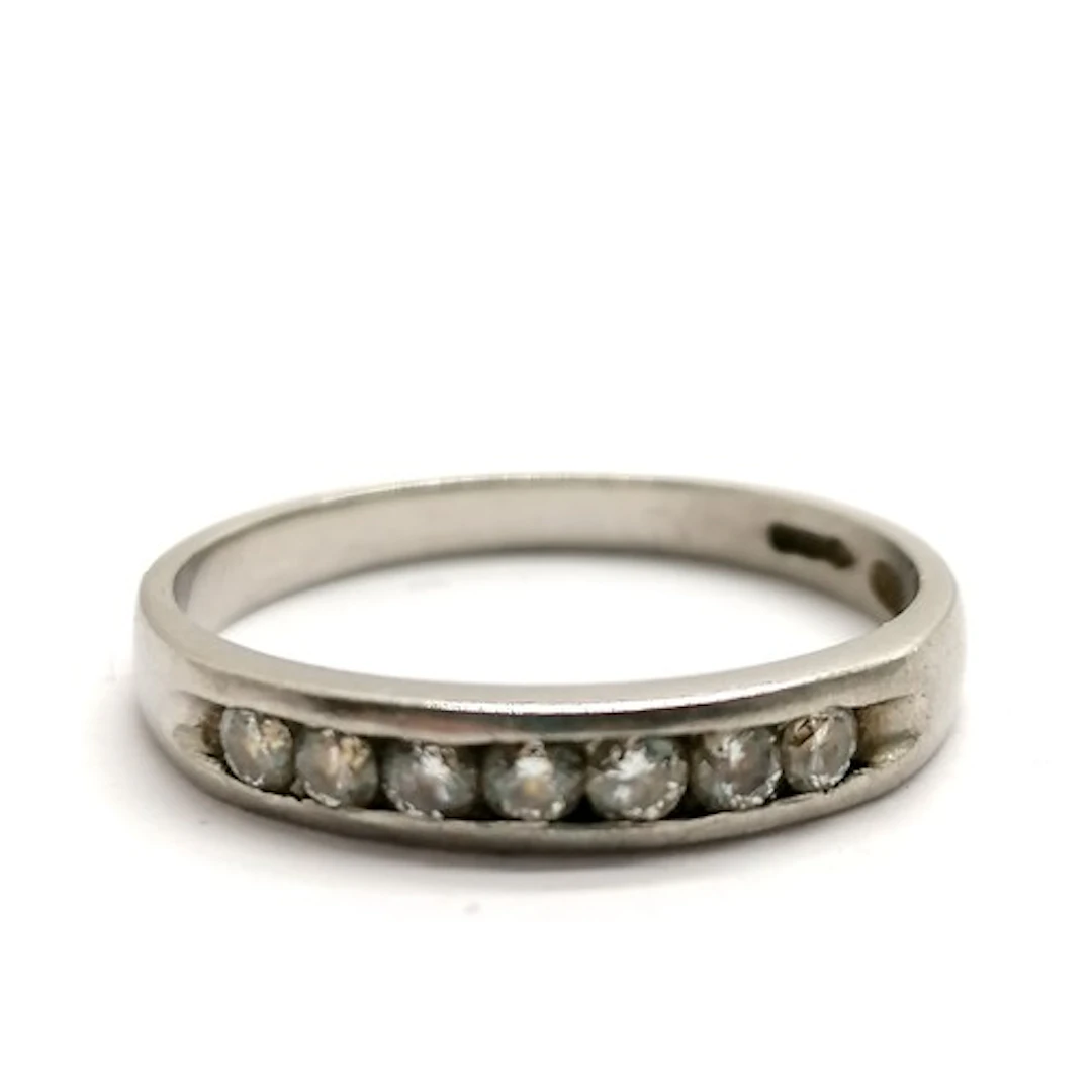 Platinum marked channel set diamond ring - size Q½ & 3.7g to...