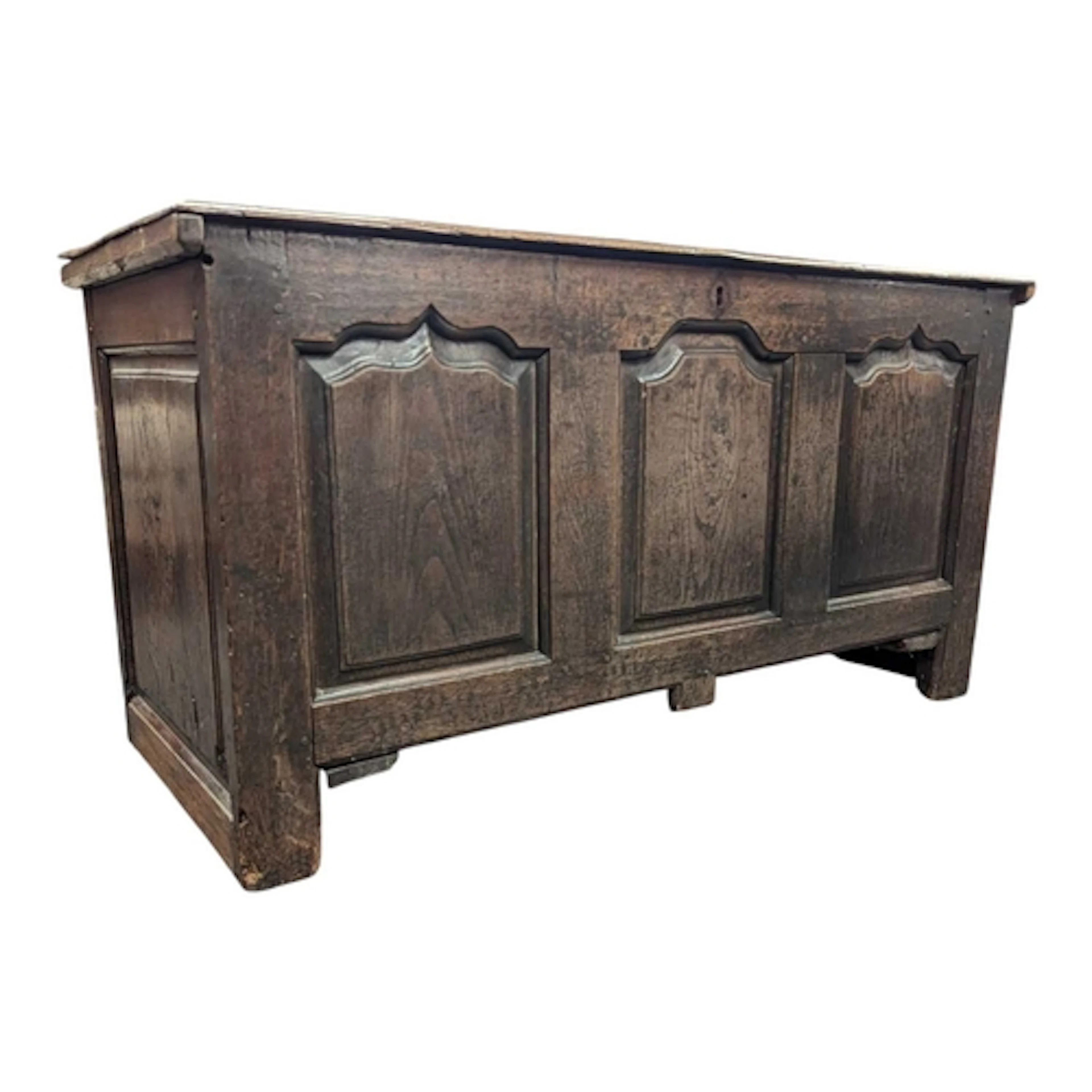 An 18th century oak coffer. The coffer having fielded panell...
