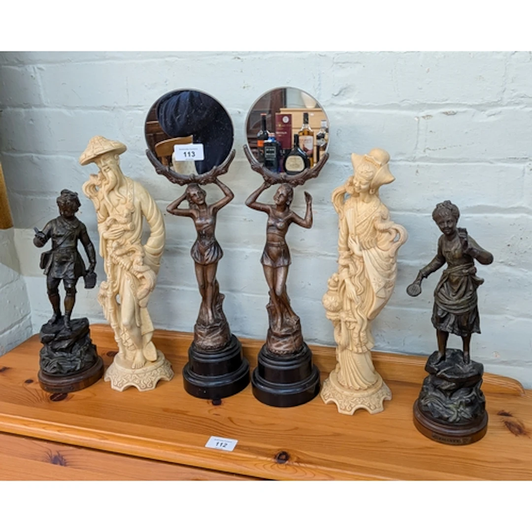 A pair of Deco style lady figures with mirrors together with...
