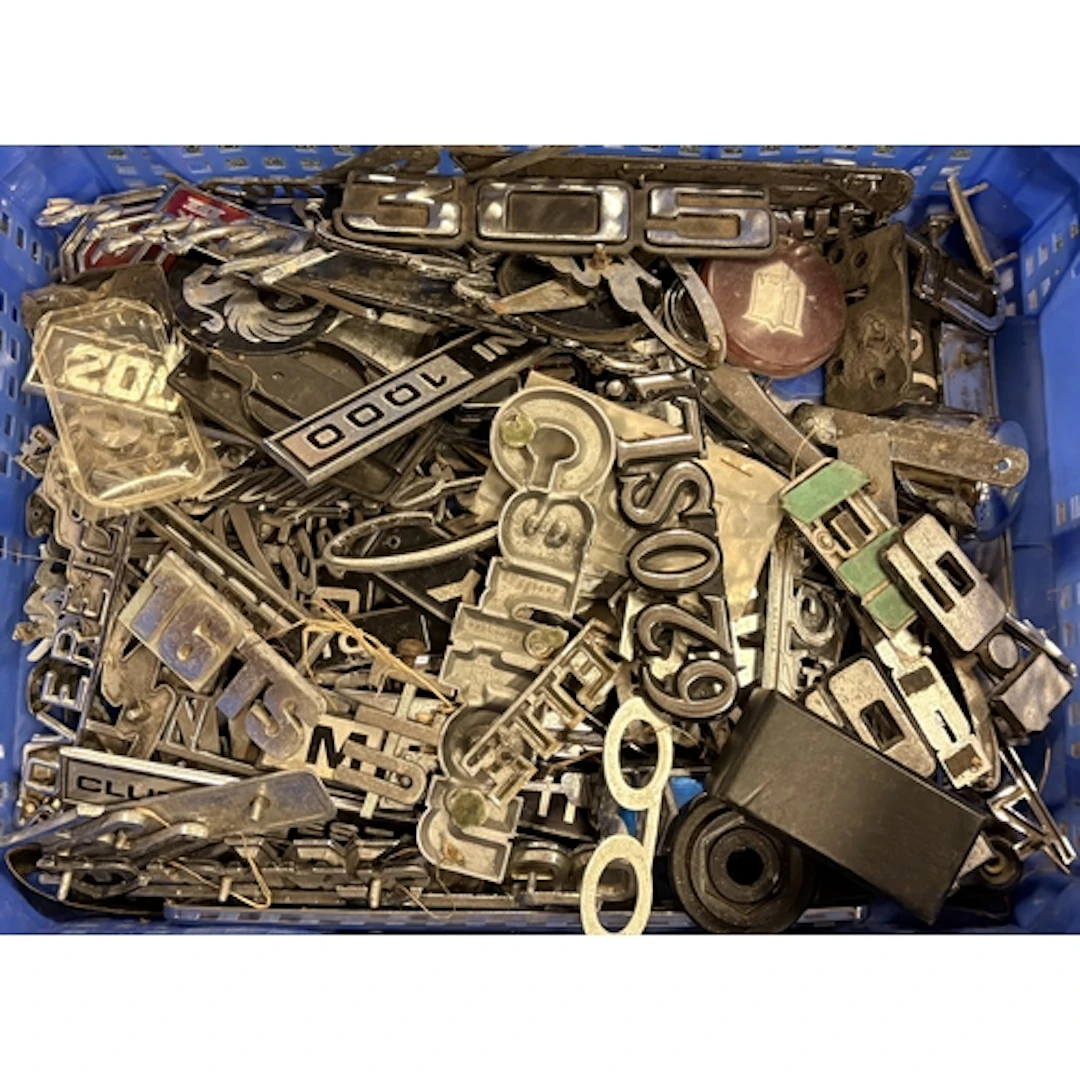 A collection of vintage motorcar badges. Est. £20 - £30.