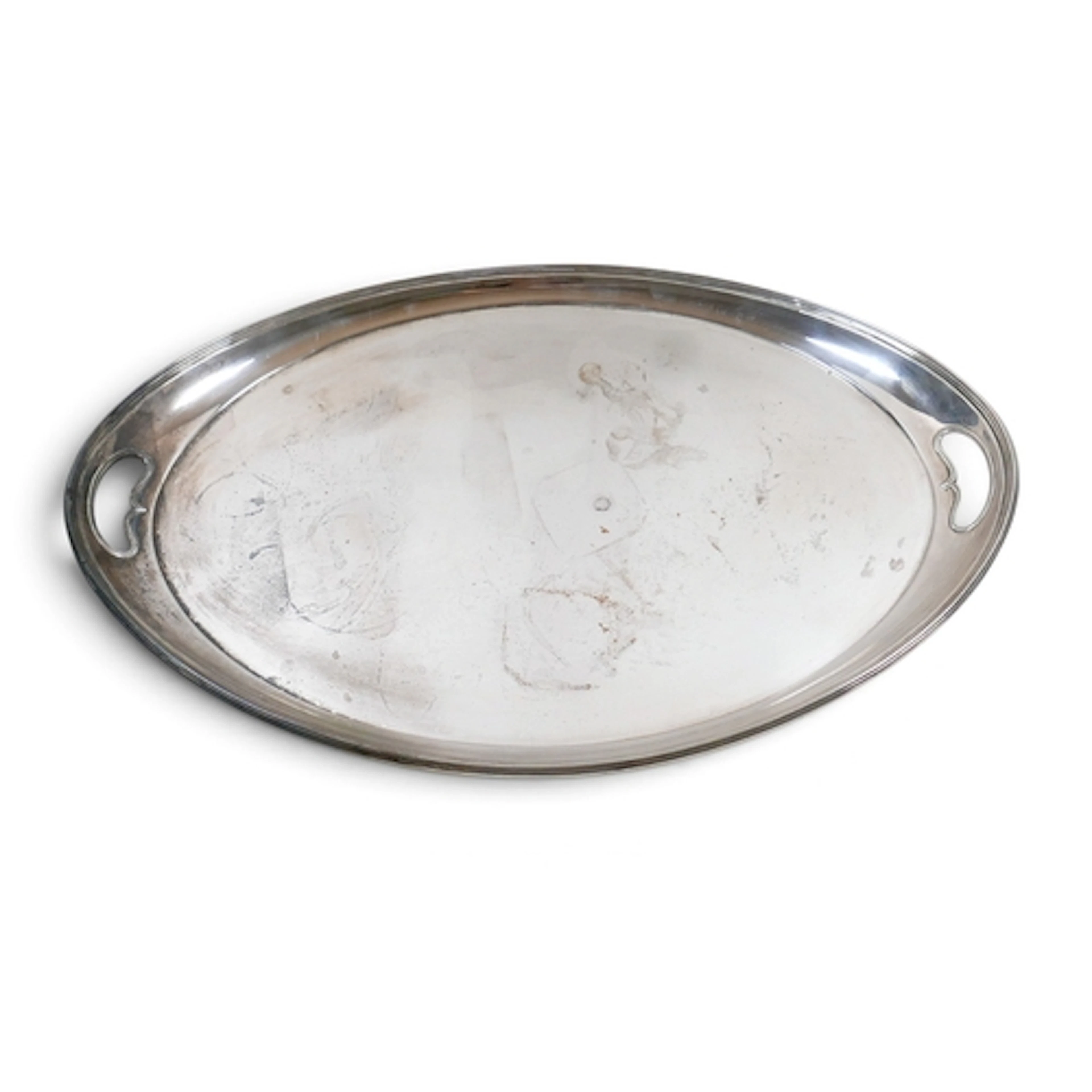 AN ART DECO SILVER TRAY. of oval form with twin kidney shape...