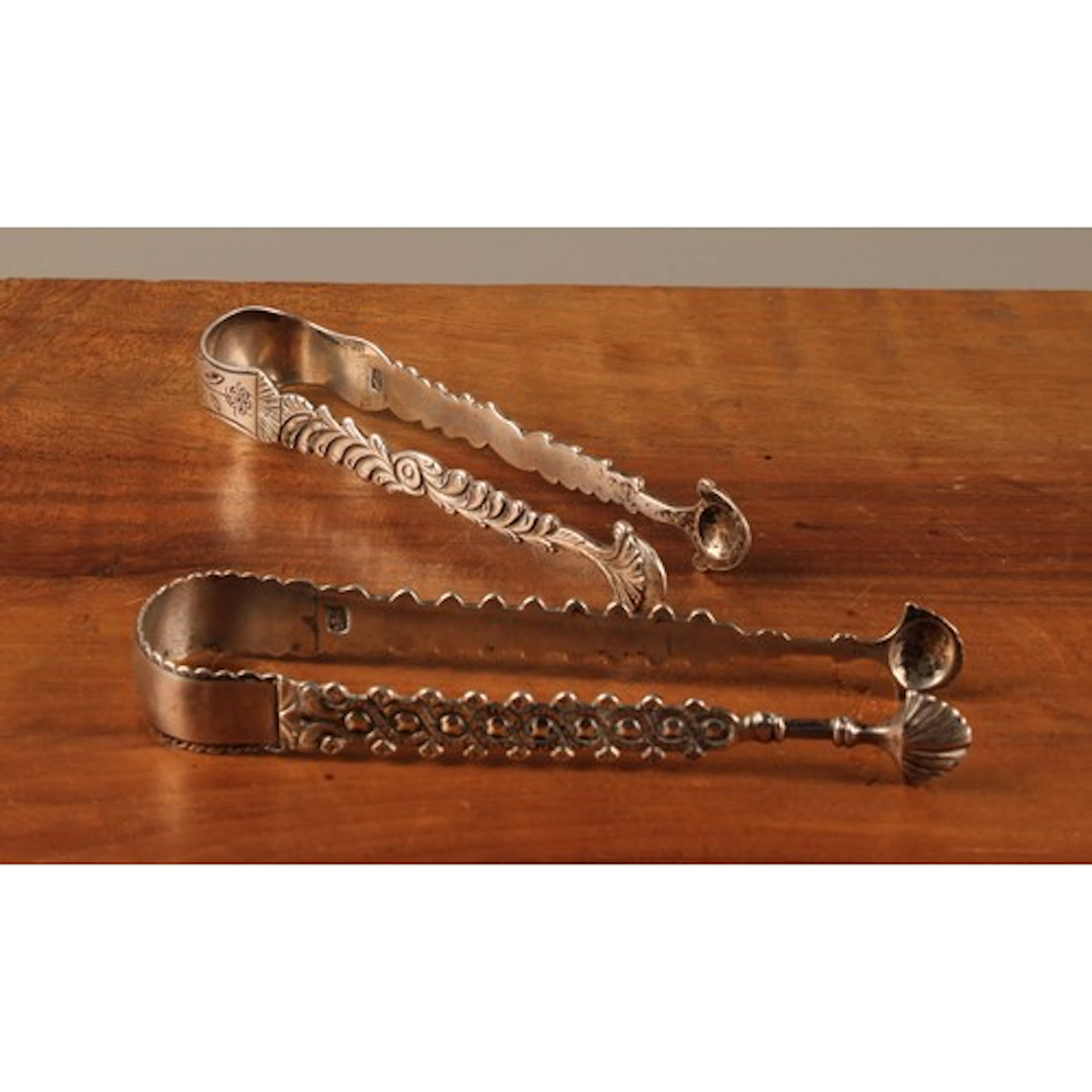 A pair of George III silver sugar bows, 12.5cm long, Hester ...