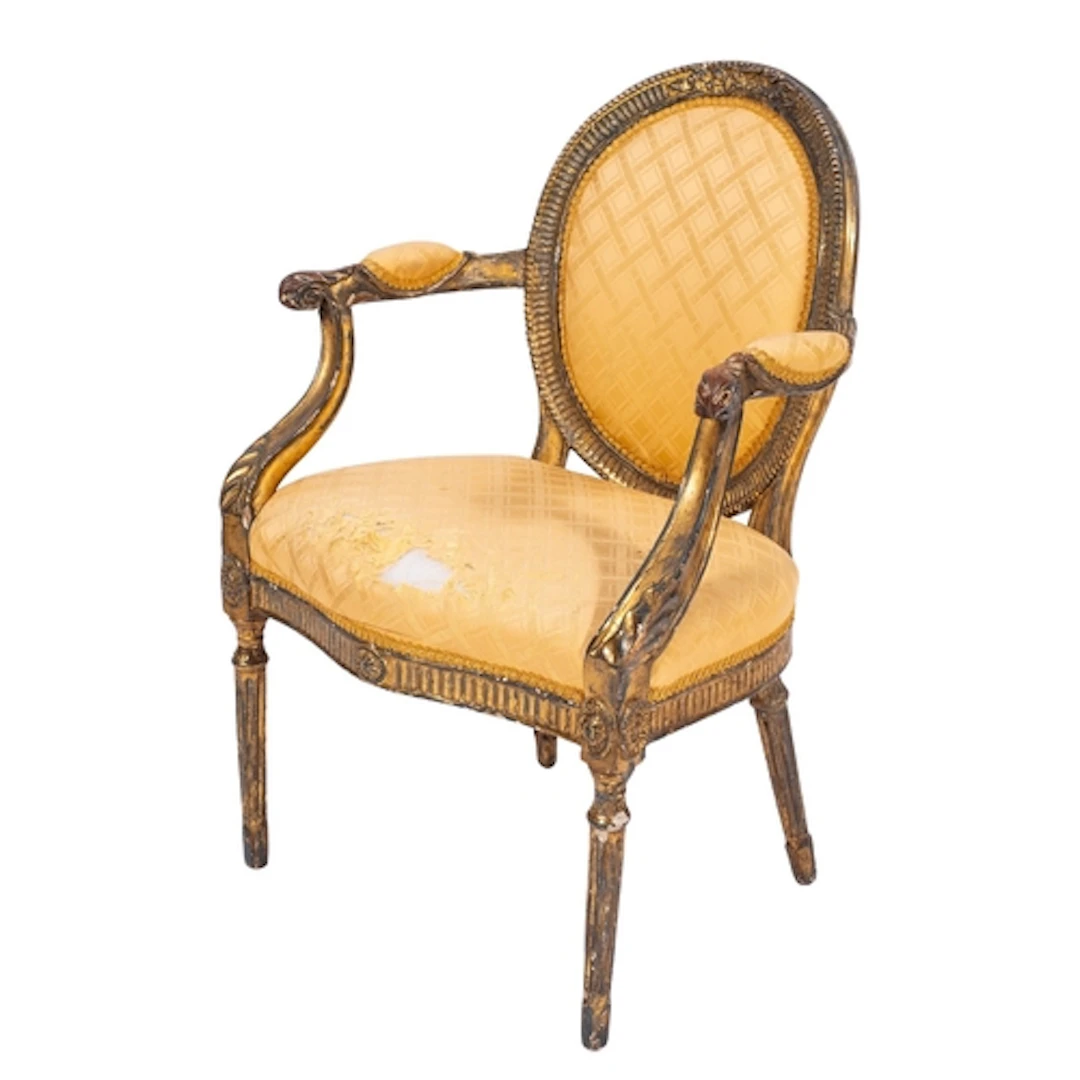 A carved and giltwood elbow chair in George III style, proba...