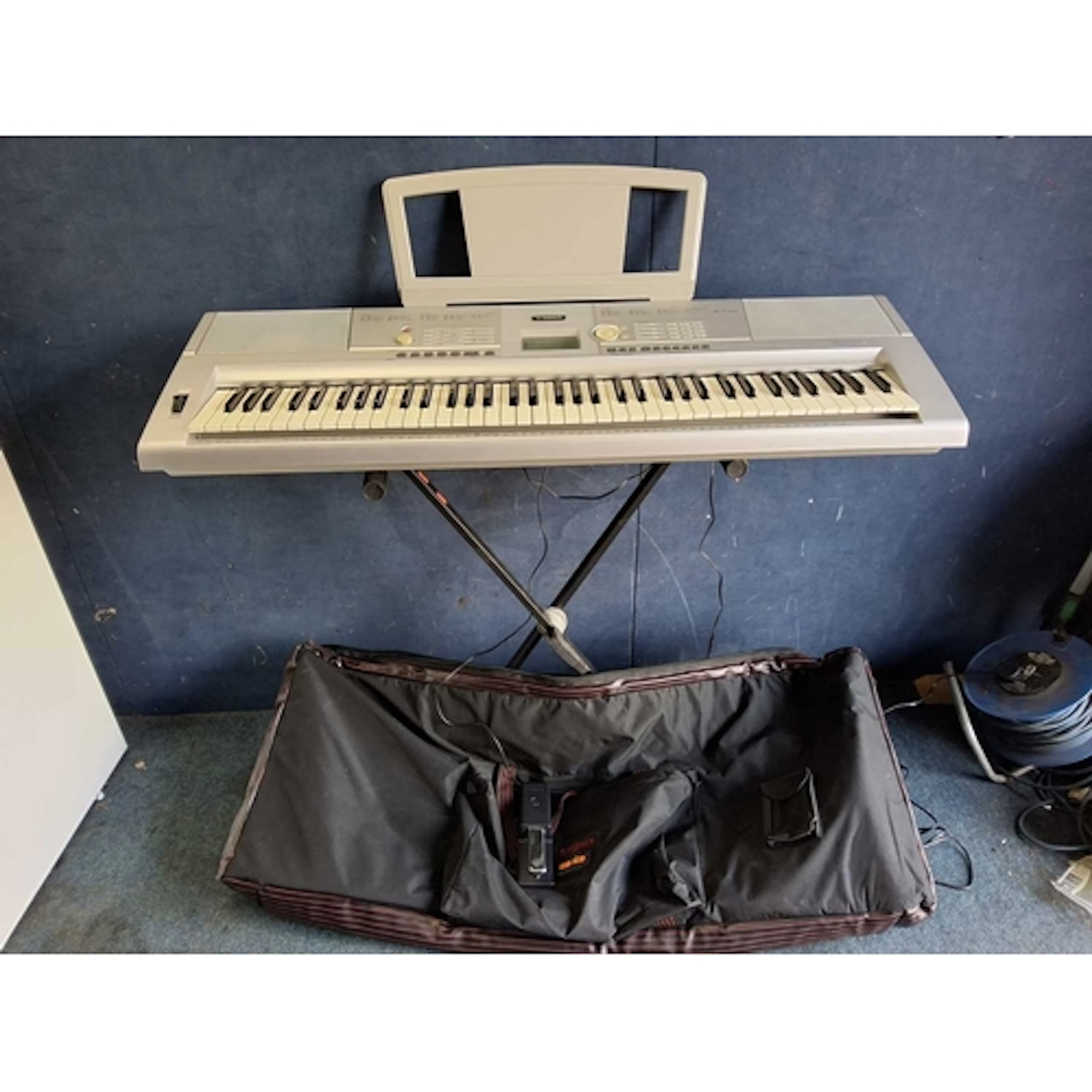 A YAMAHA DGX-205 PORTABLE GRAND ELECTRONIC KEYBOARD with pow...