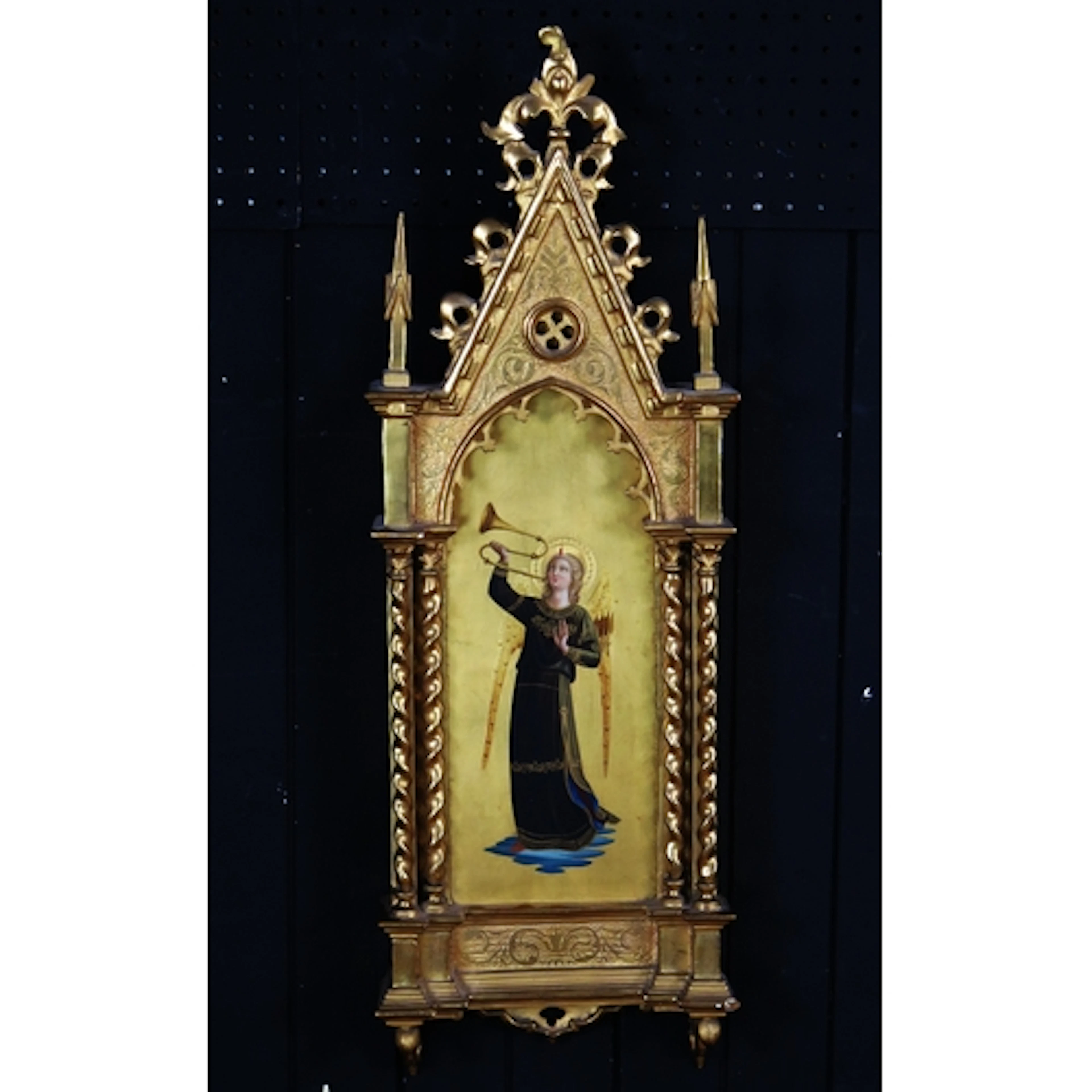 A 19th century Florentine style niche of arched outline, sur...