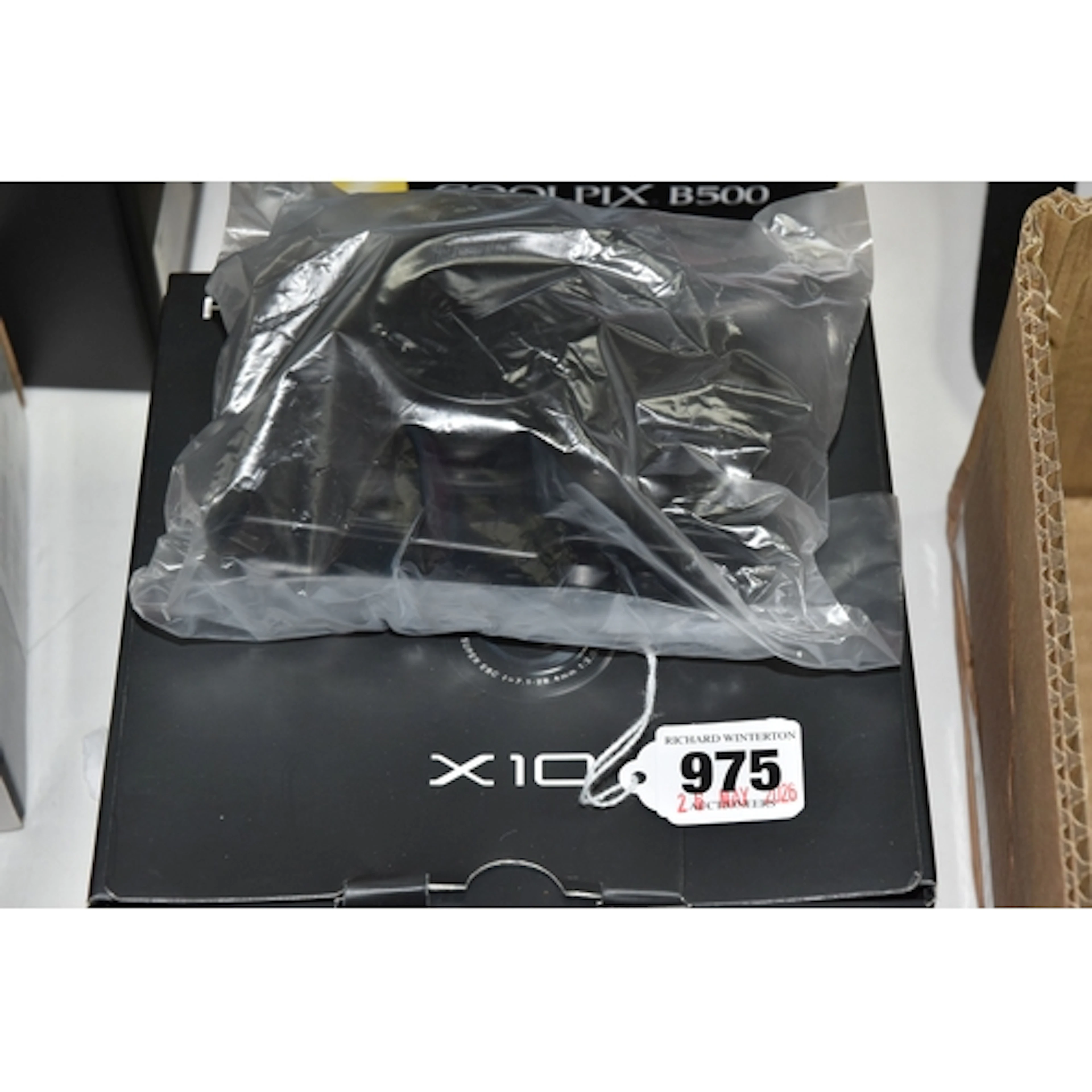A BOXED FACTORY SEALED FUJIFILM X10 DIGITAL CAMERA, camera i...