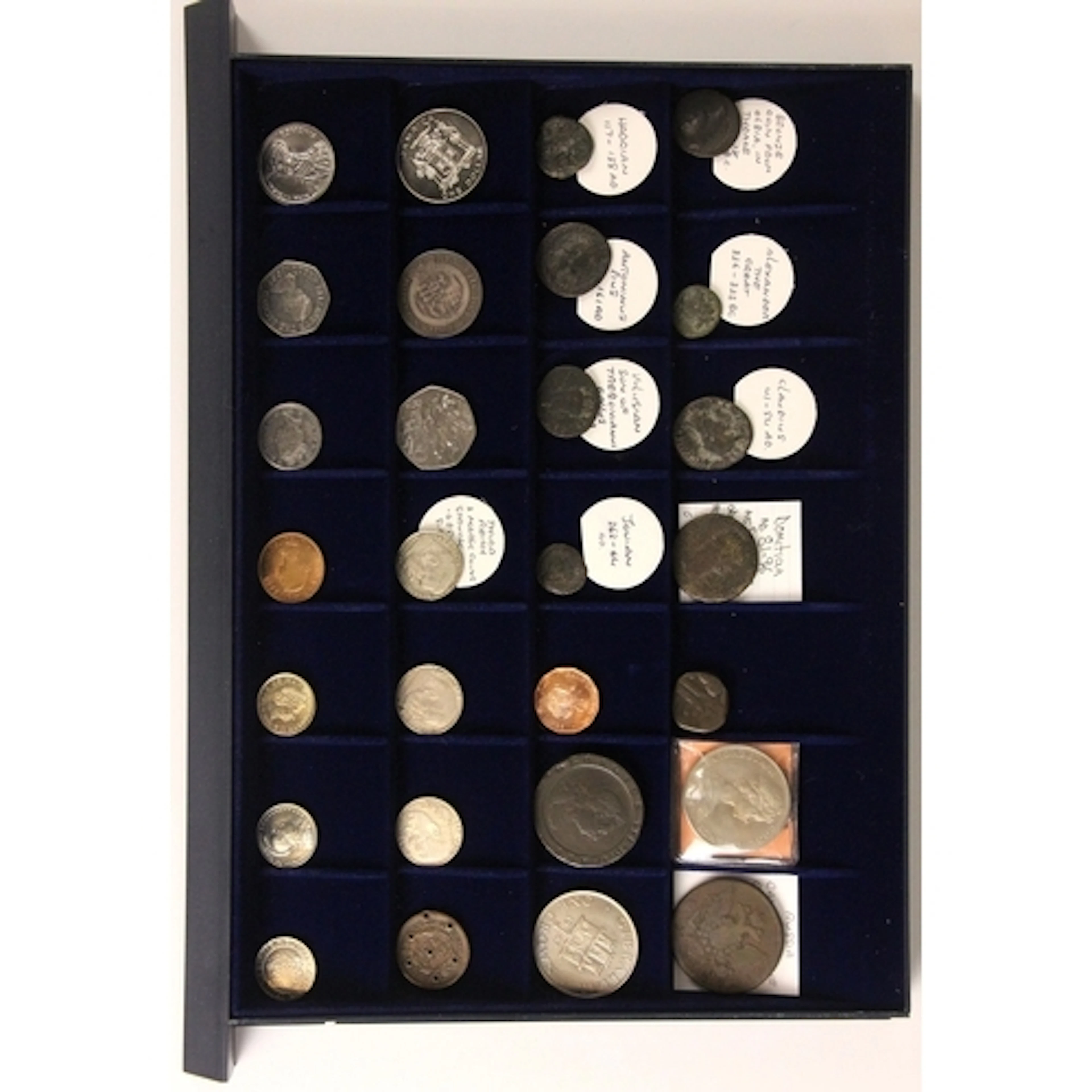 A collection of predominately Roman coins, to five trays, to...