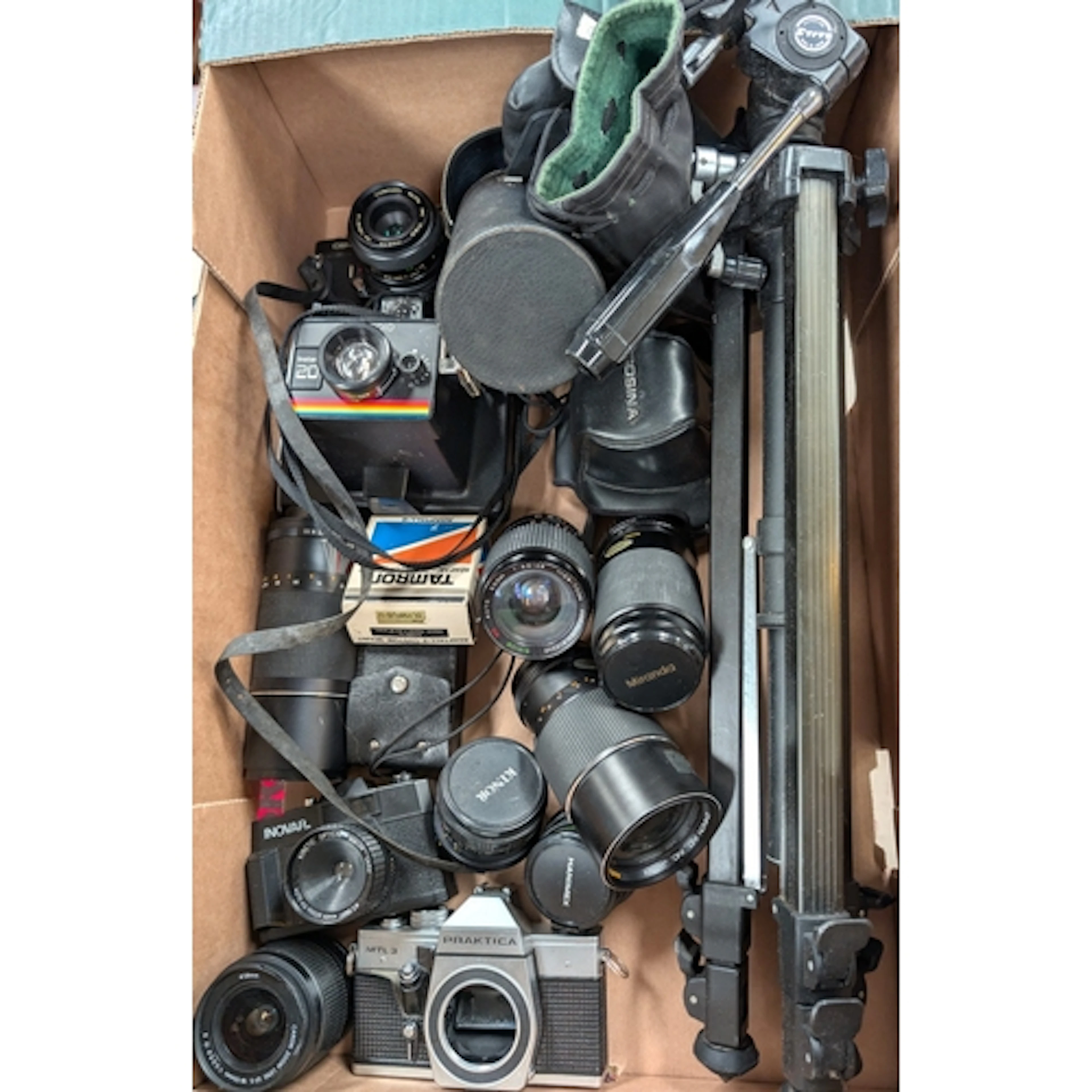 A collection of various cameras and lenses, various focal le...