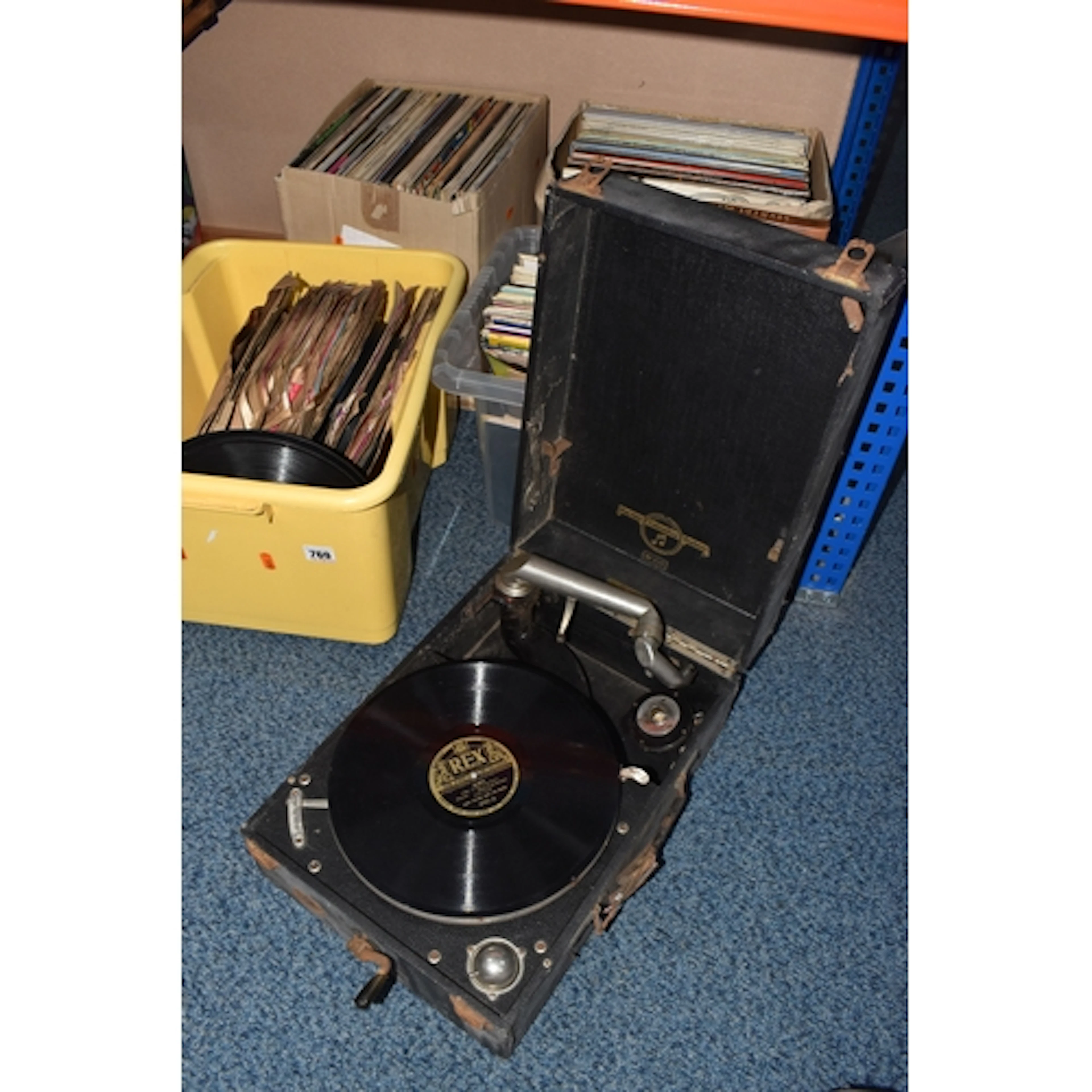 FOUR BOXES OF ASSORTED RECORDS AND A GRAMOPHONE to include a...