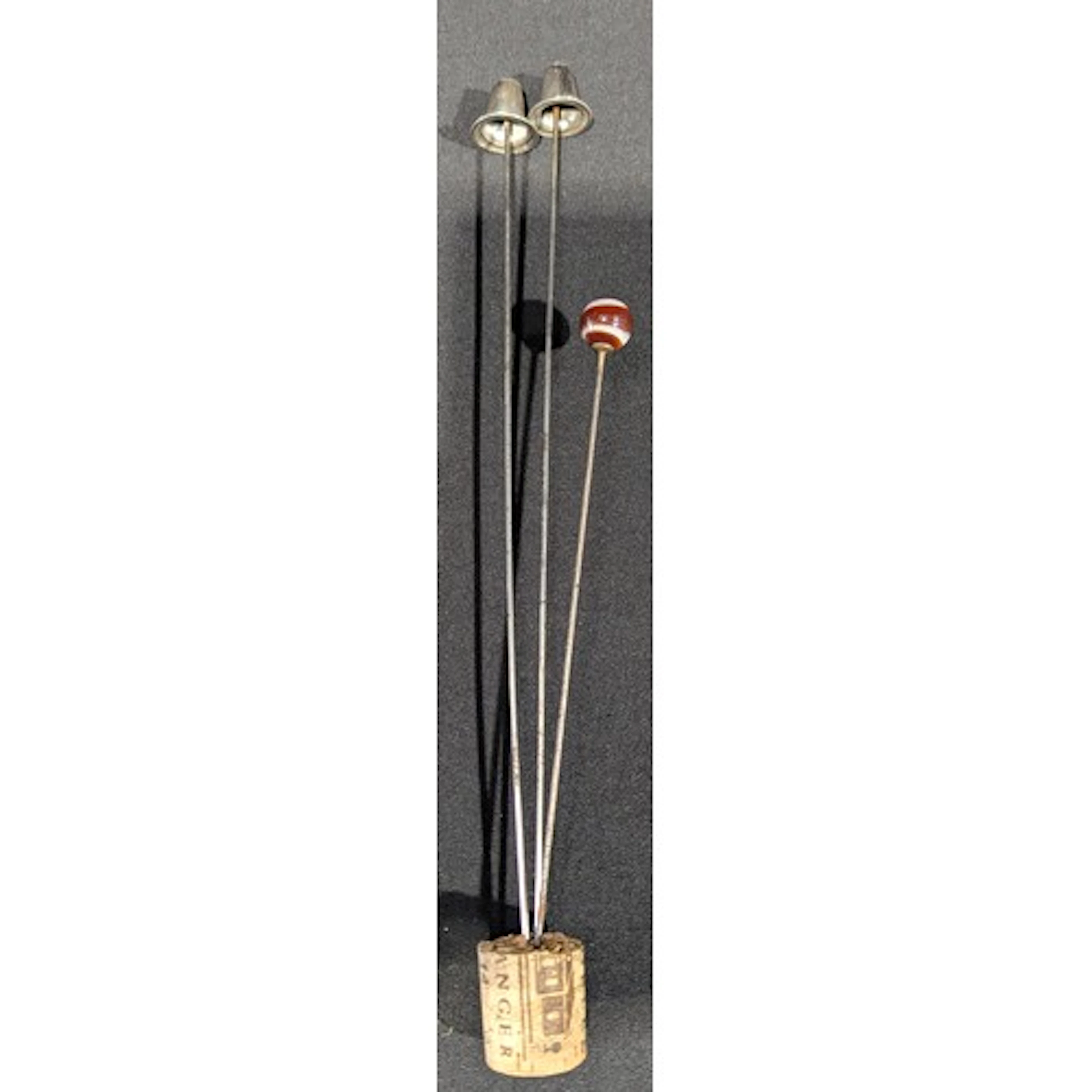 A pair of hallmarked silver Welsh hat design hat pins, stain...