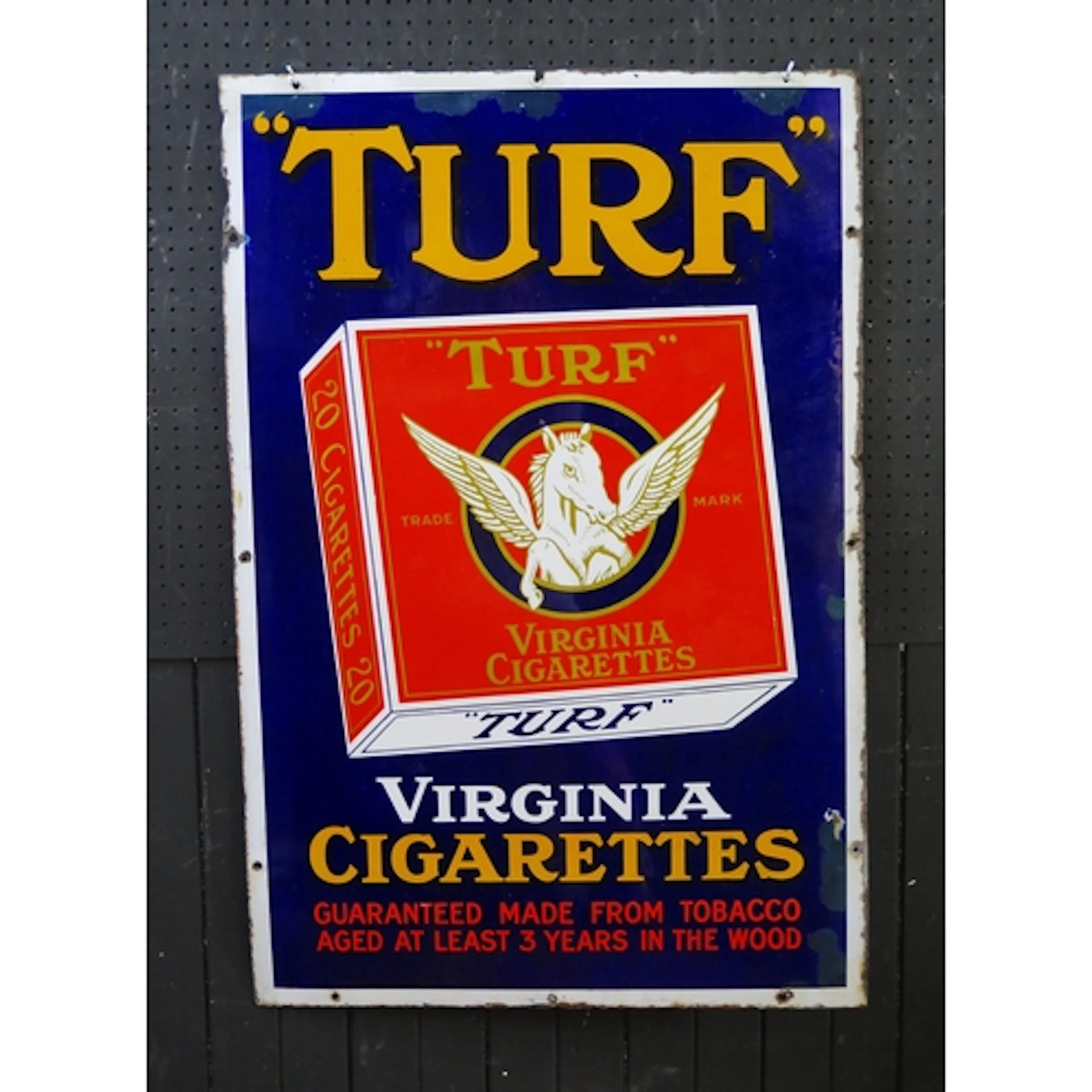"Turf Virginia Cigarettes" - an enamel advertising sign, 91 ...