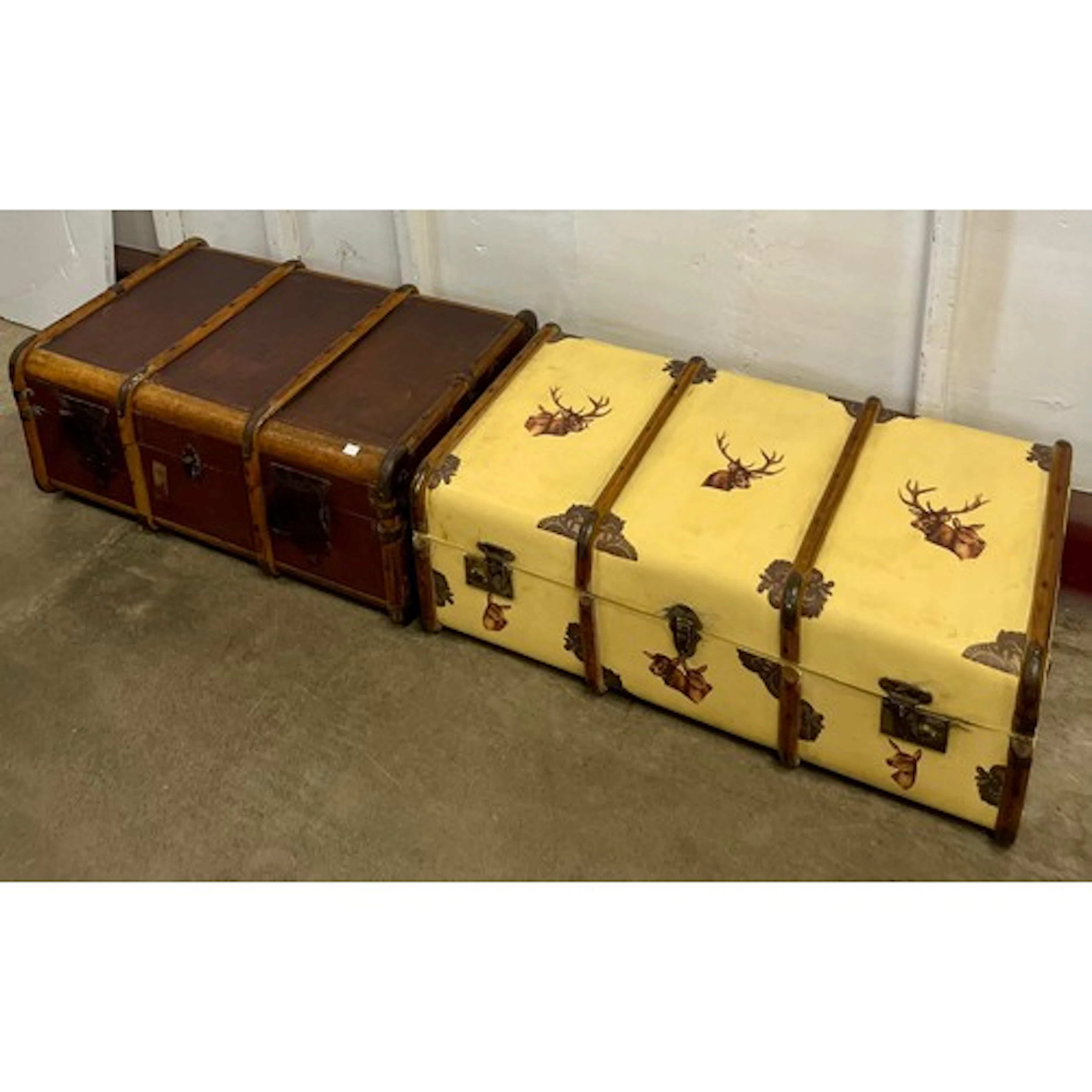 Two vintage banded travel trunks