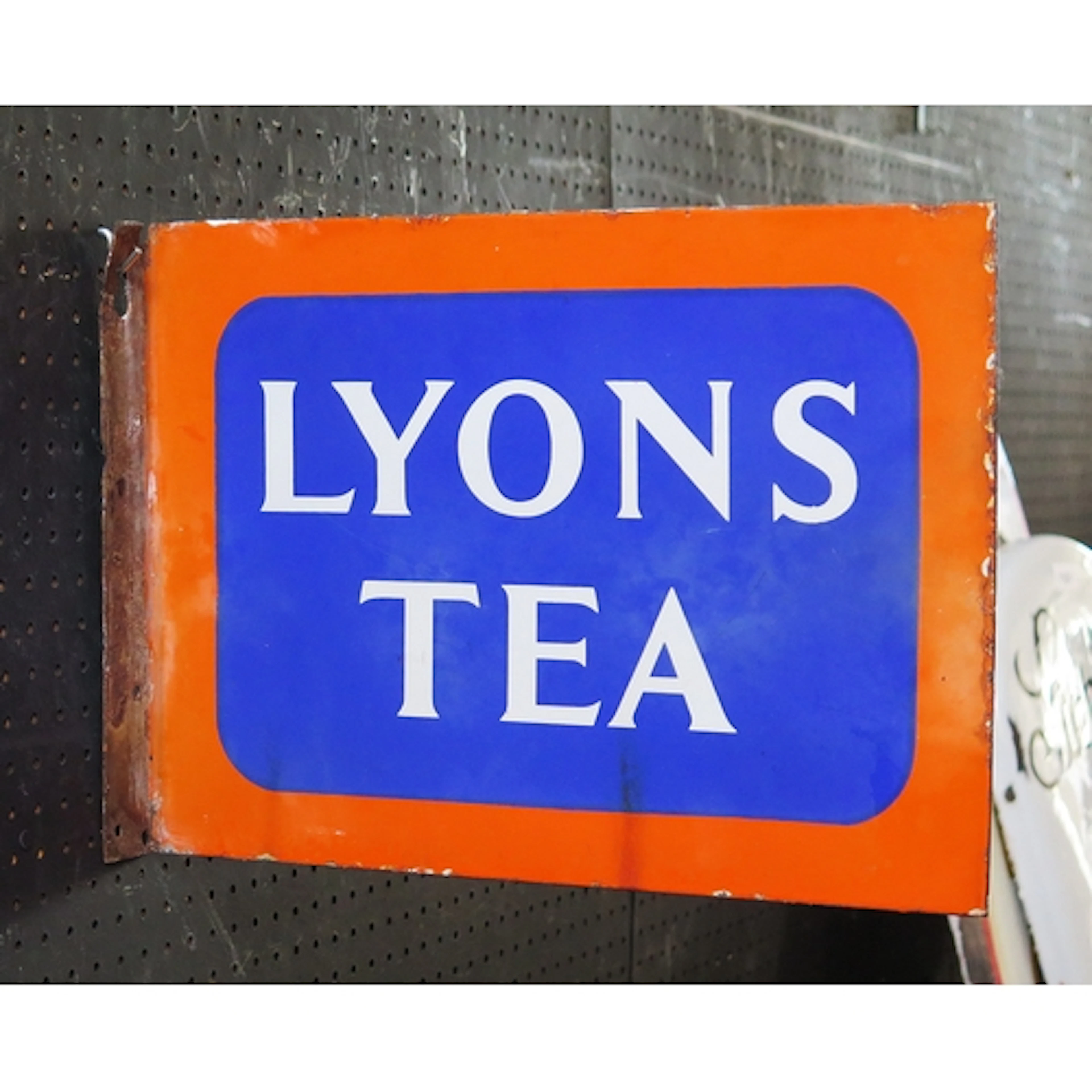 "Lyons Tea" - an enamel double sided advertising sign, 28cm ...