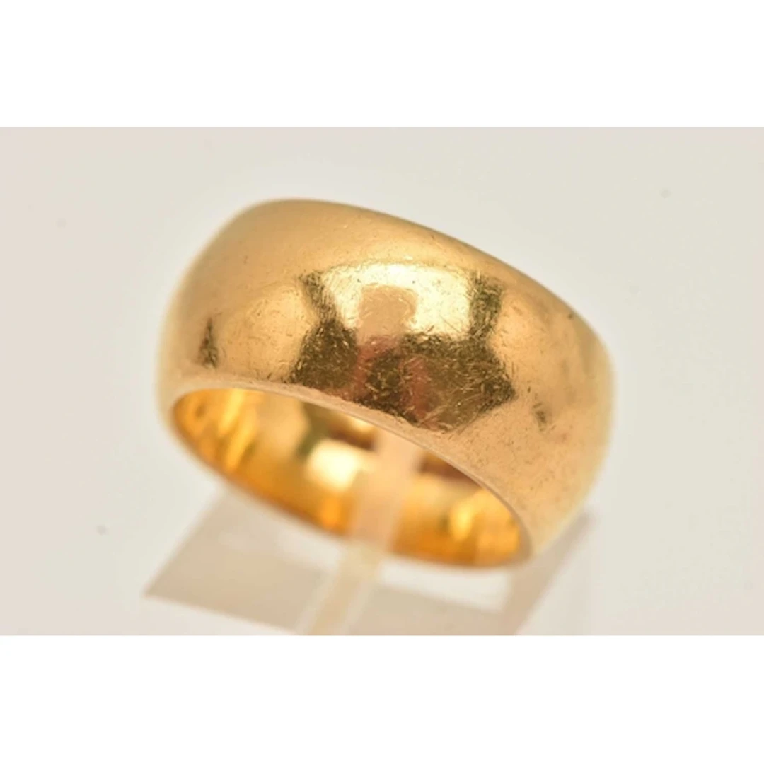 A HEAVY AND WIDE 22CT GOLD WEDDING BAND RING, approximate ba...
