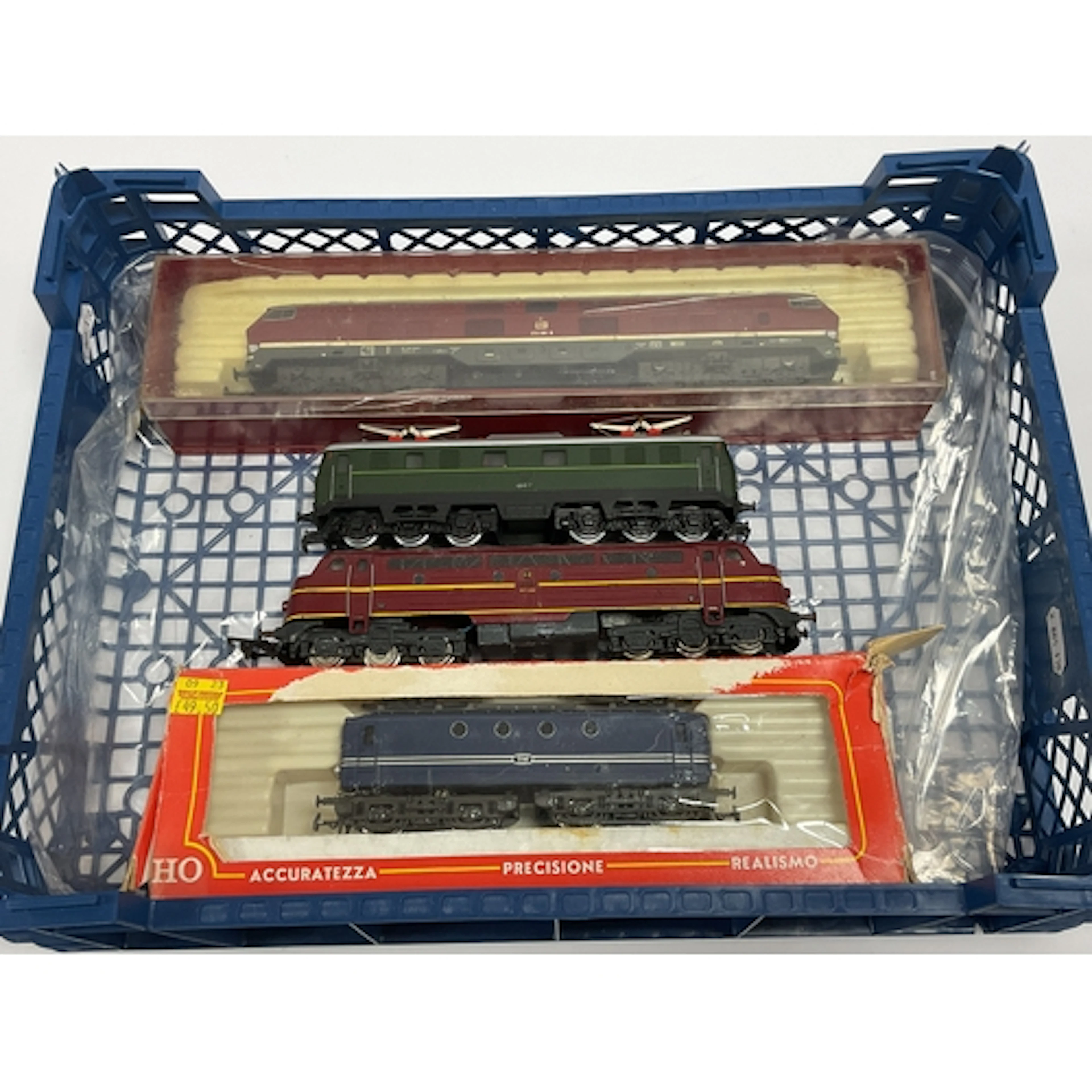 Four HO scale European locomotives: a boxed Rivarossi DB (Ge...