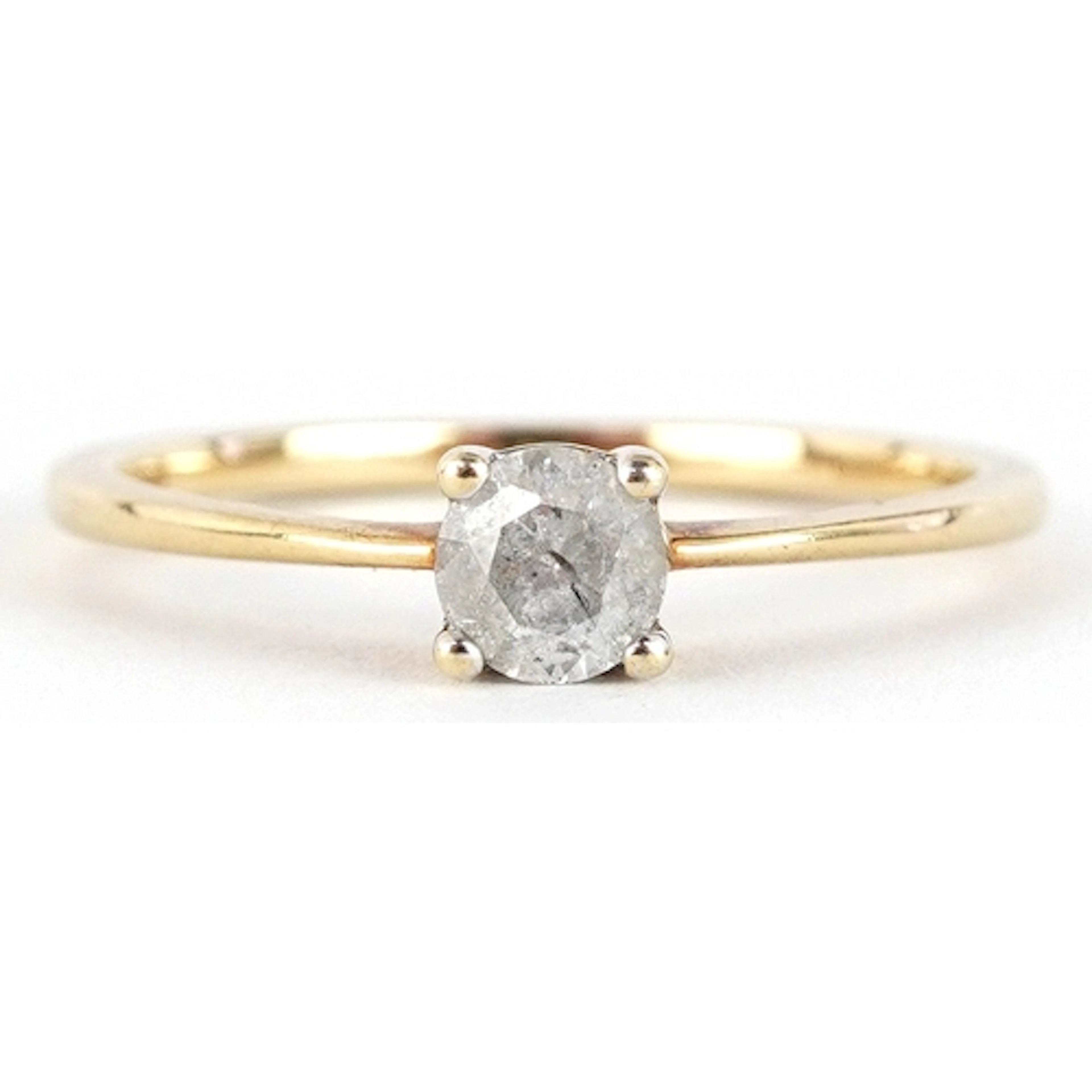 10K gold diamond solitaire ring, the diamond approximately 0...