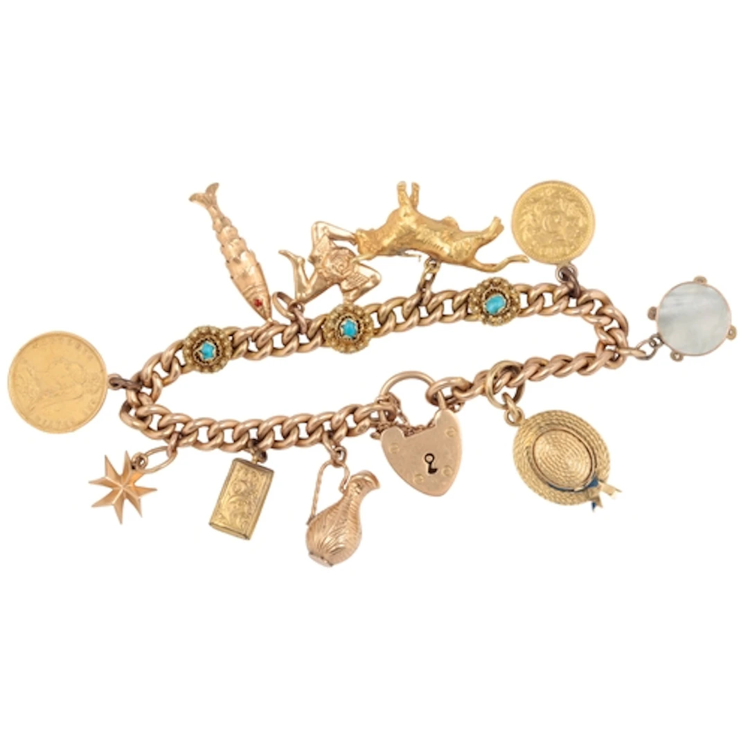 A gold charm bracelet, early-mid 20th century, the bracelet ...