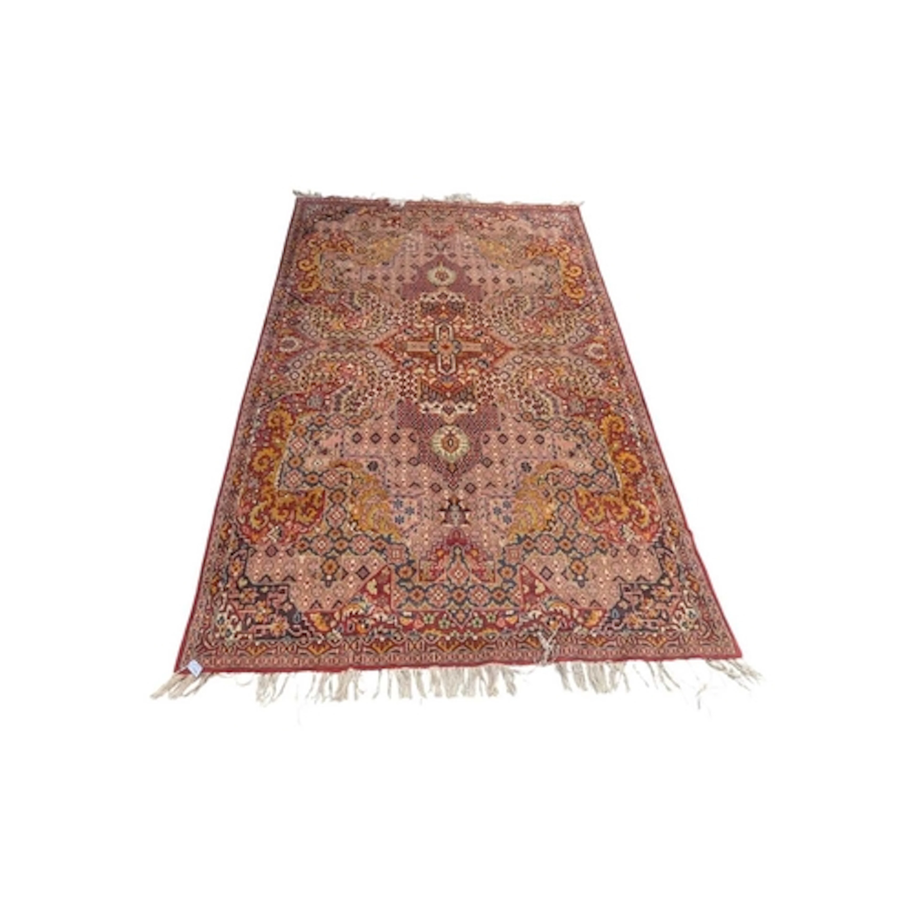 A karastan oriental asian style carpet floor rug. On a red g...