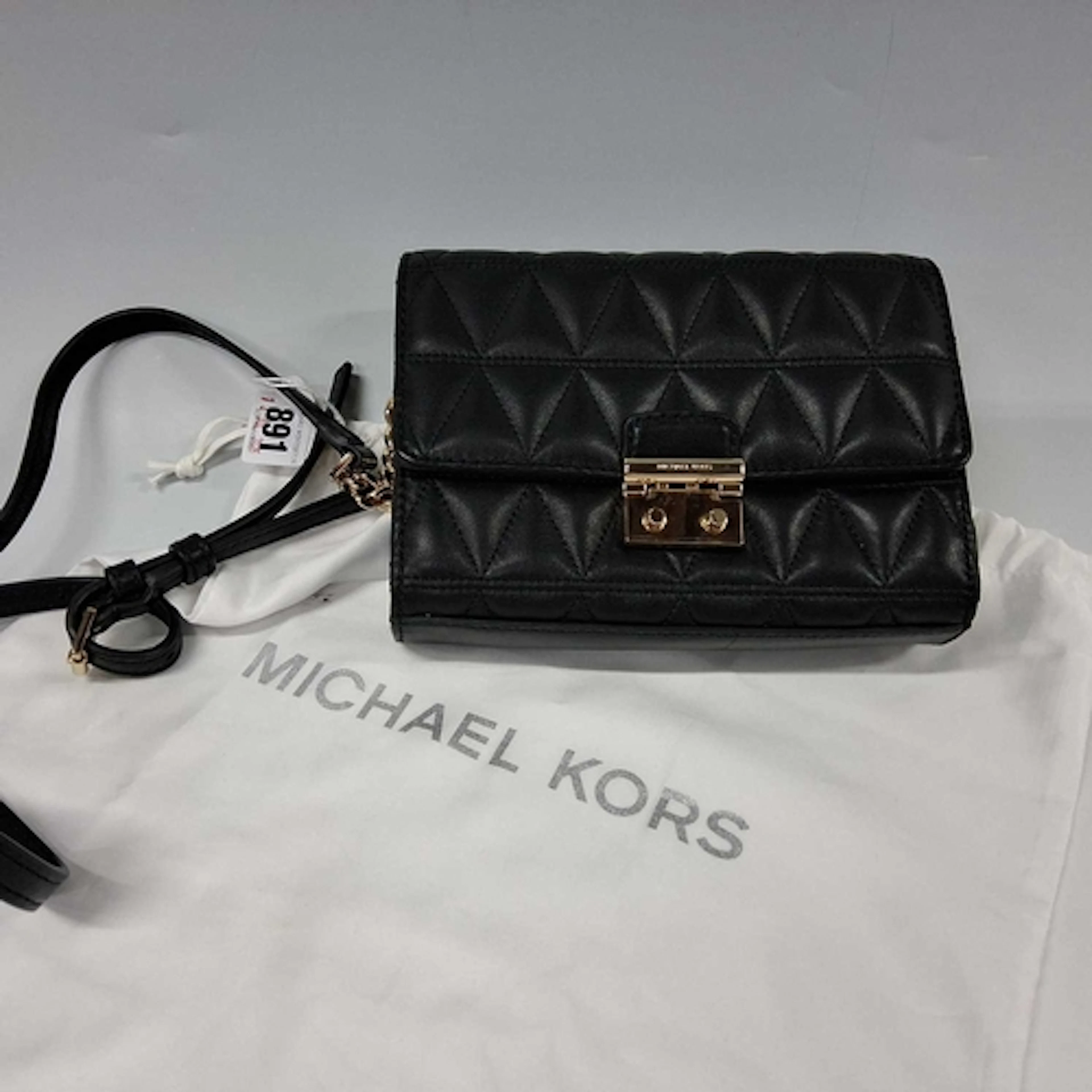 MICHAEL KORS BLACK QUILTED CROSSBODY BAG, featuring adjustab...