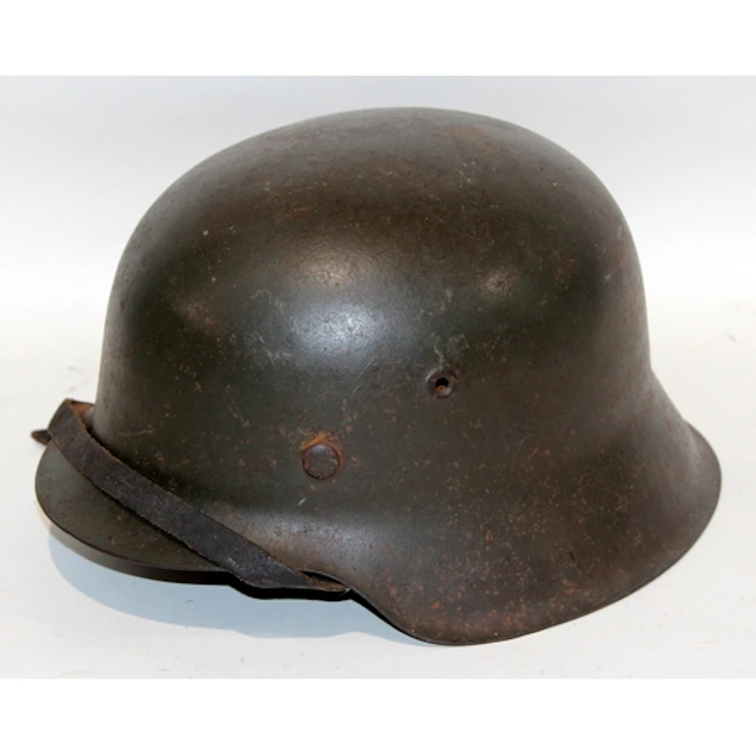 Original WWII German M42 Stahlhelm combat helmet c/w liner. ...