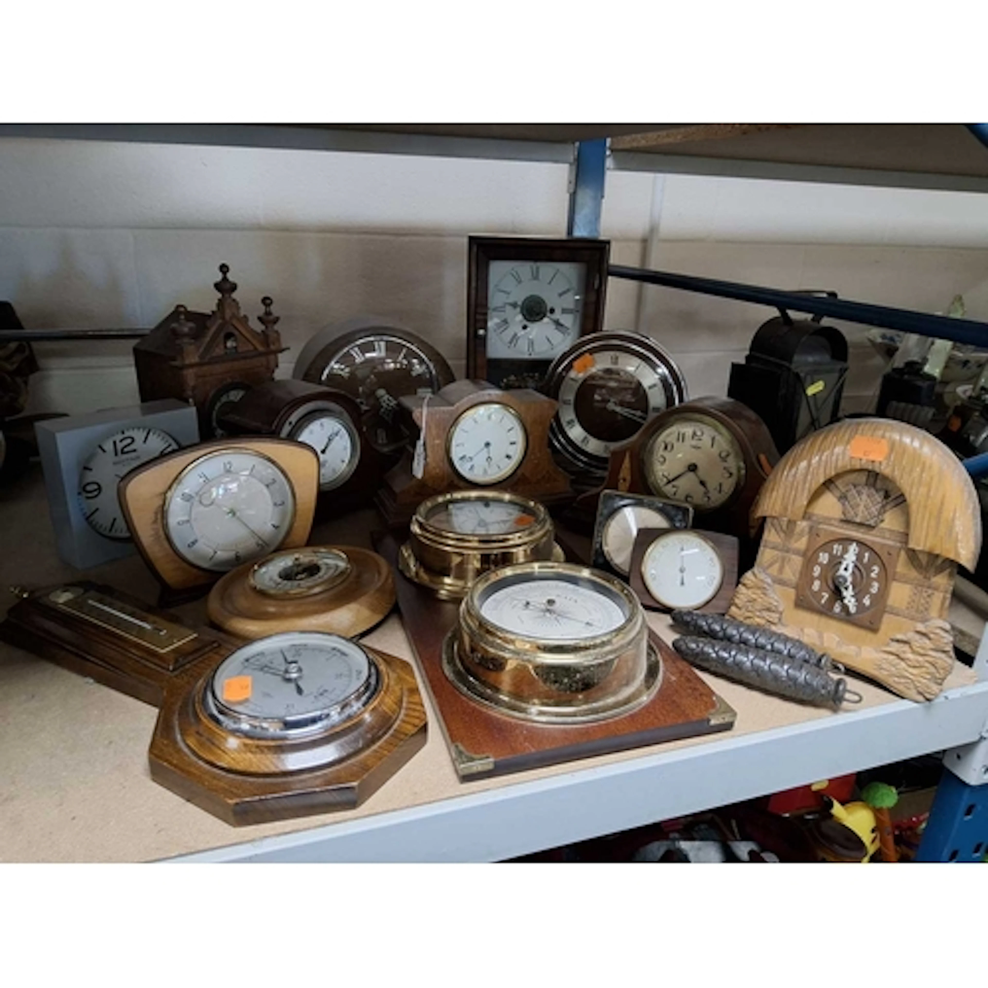 A GROUP OF VINTAGE CLOCKS AND BAROMETERS to include an Art D...