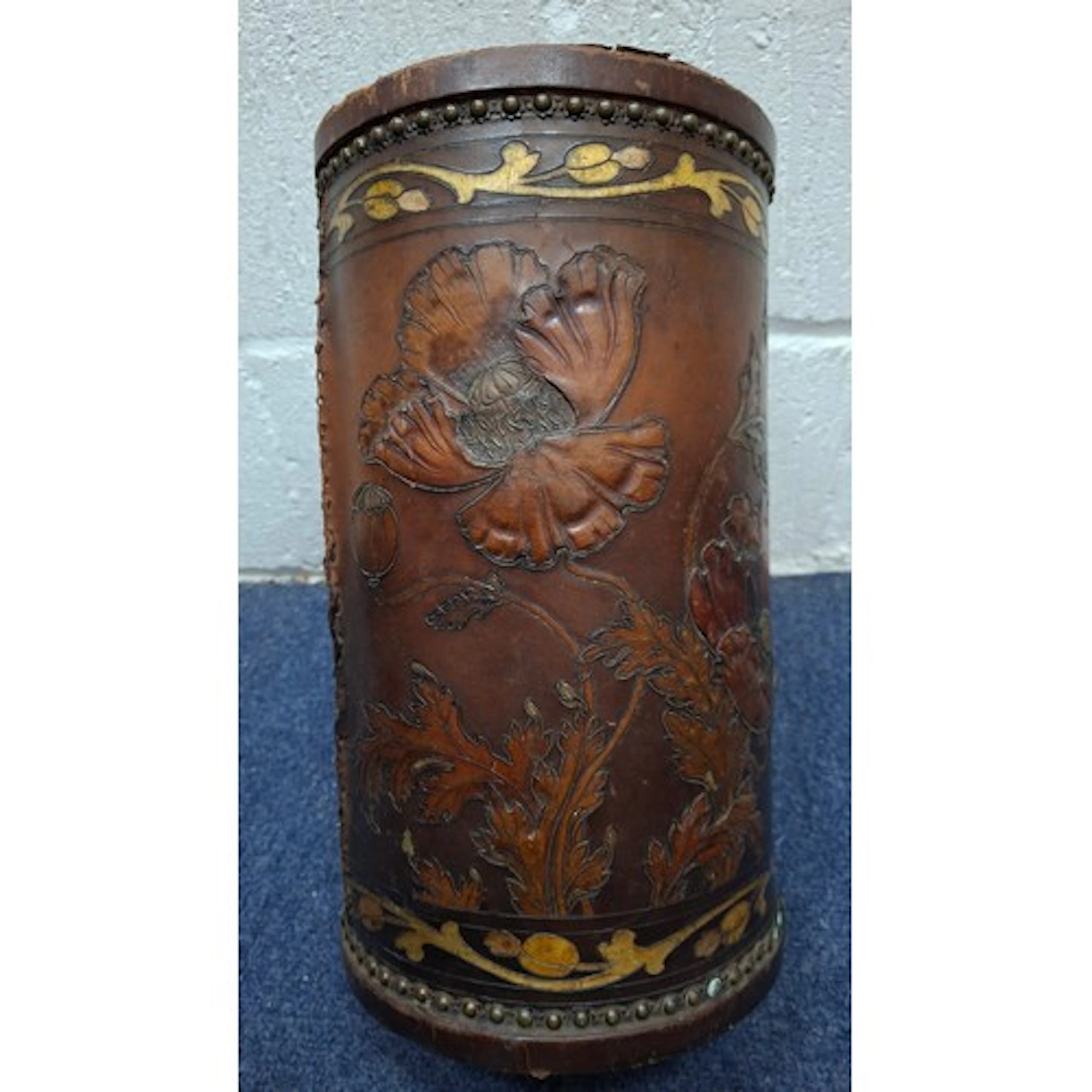 A circa 1900 German Art Nouveau brown embossed leather in re...