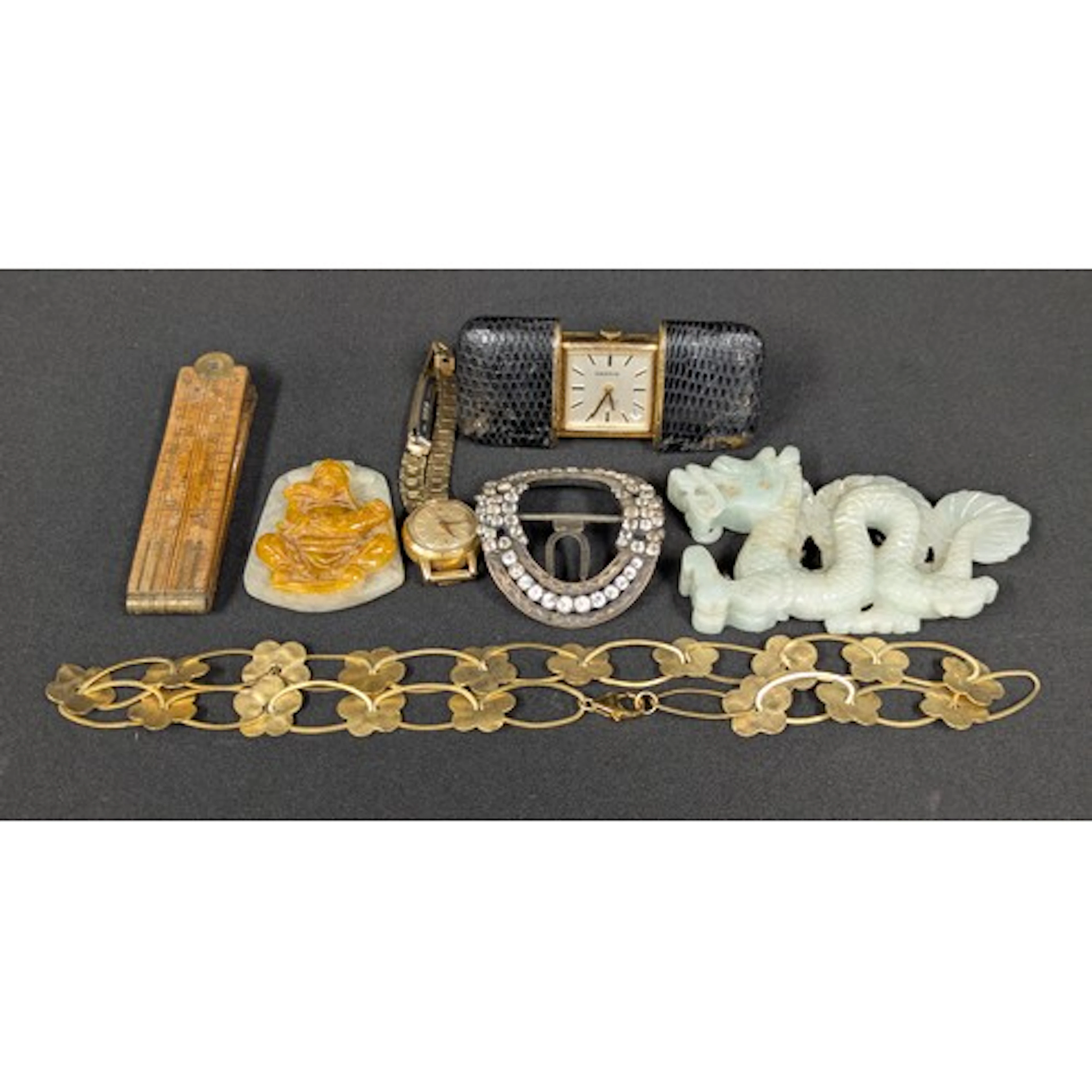 A silver-gilt Modernist necklace; a Chinese jade pendant; a ...
