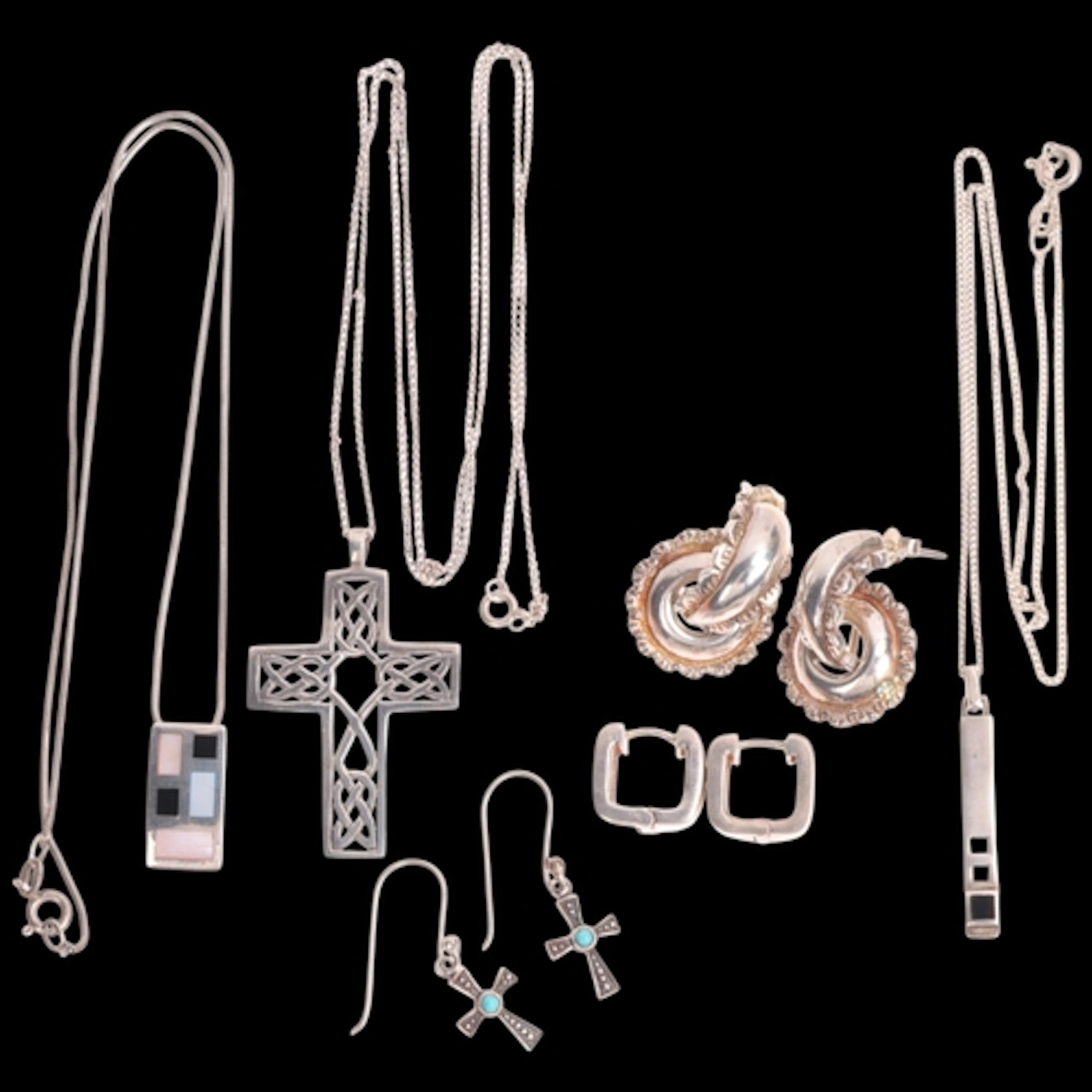 Various silver jewellery, including hoop earrings, cross pen...