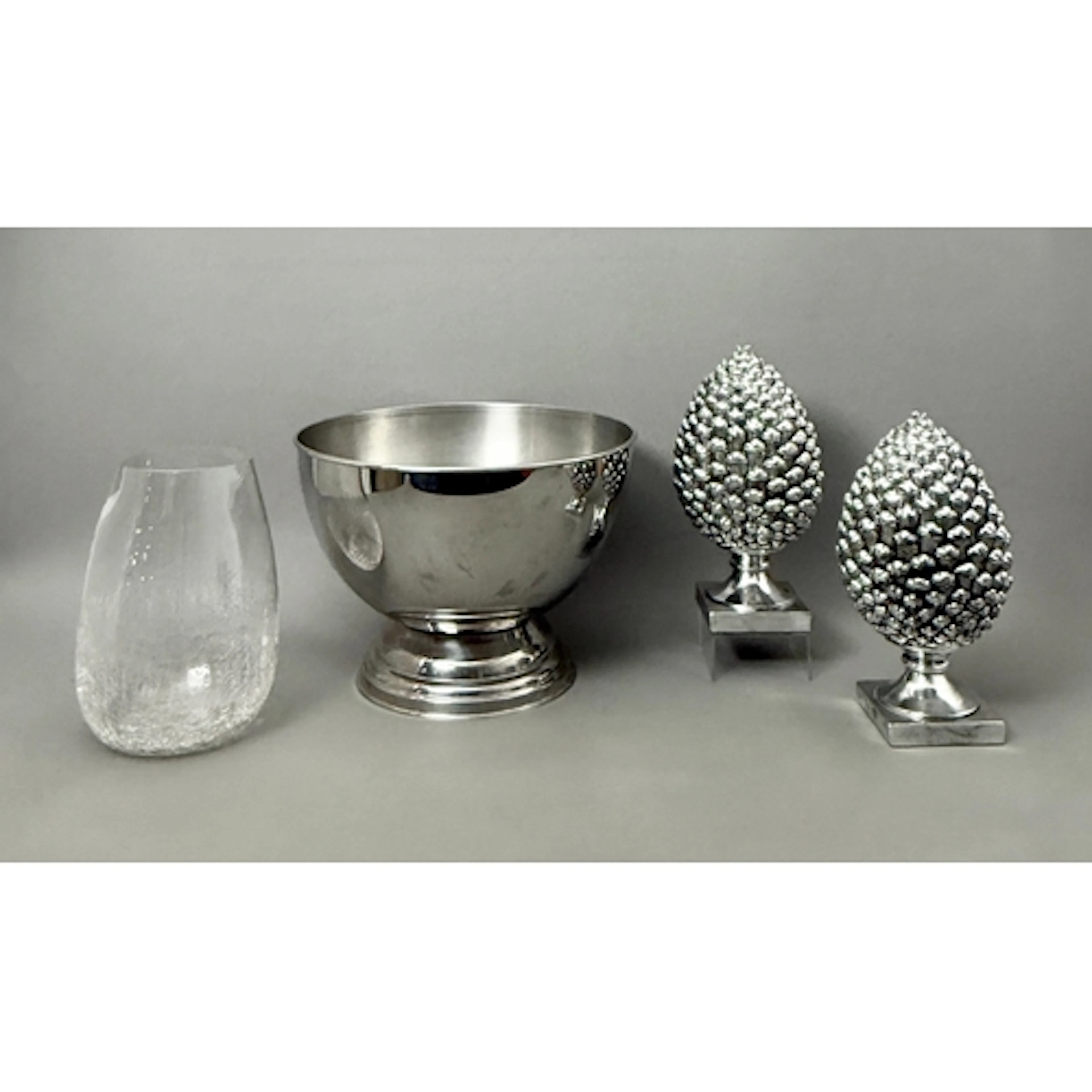Three pieces, comprising - 1. A large polished stainless s...