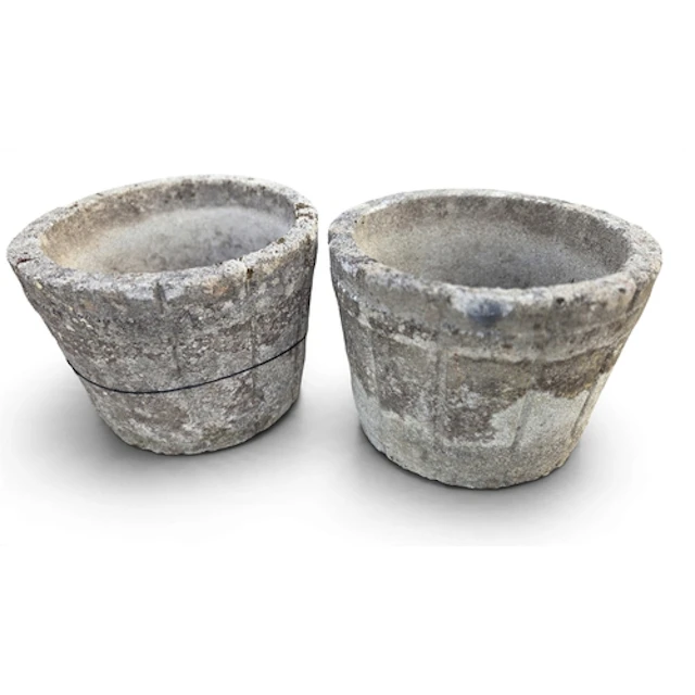 Two Stone Pots. H 23 cm approx.