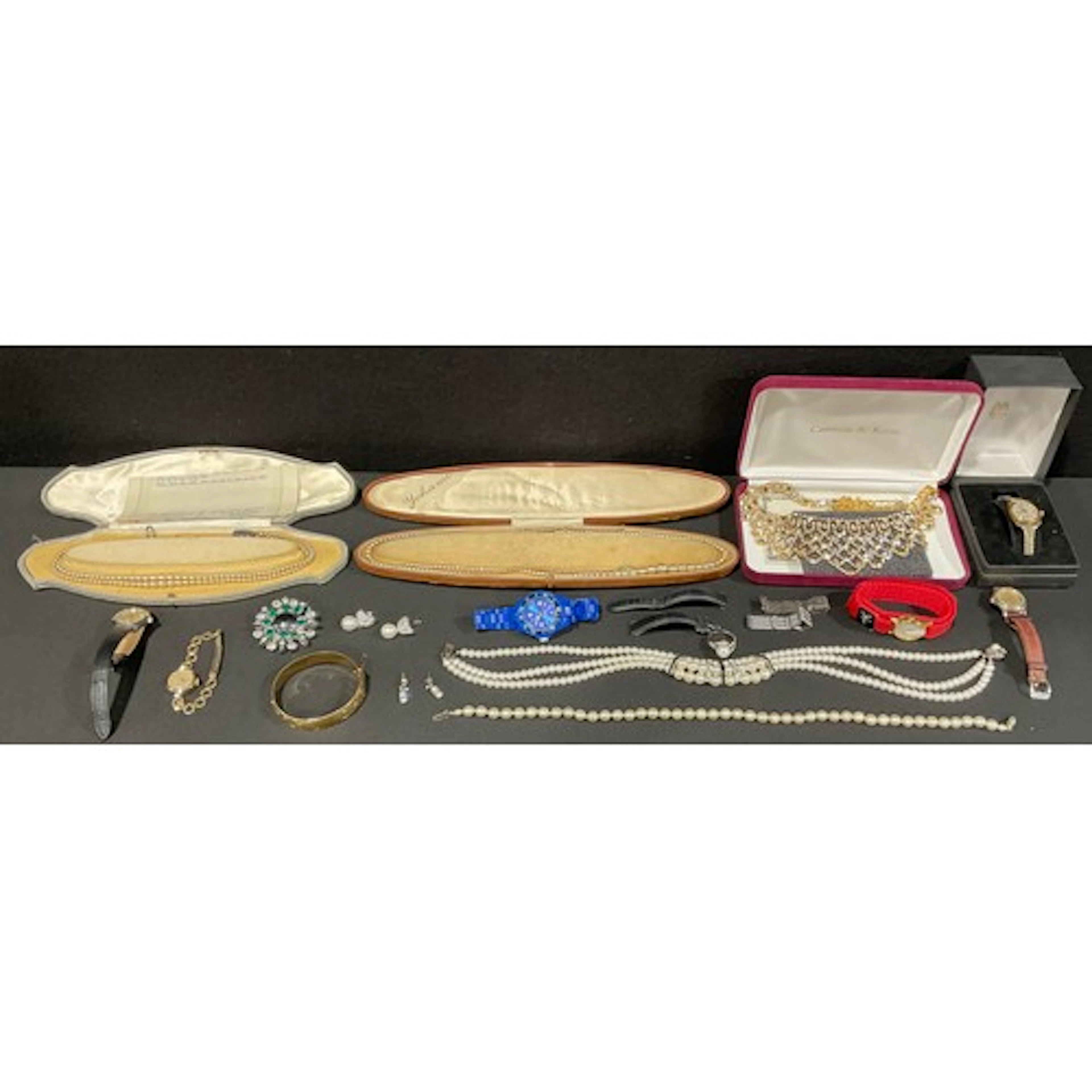A selection of silver and costume jewellery and watches, the...