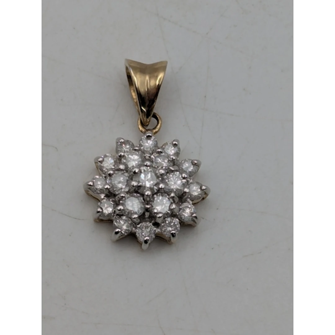 A 9ct yellow and white gold diamond cluster pendant, fashion...