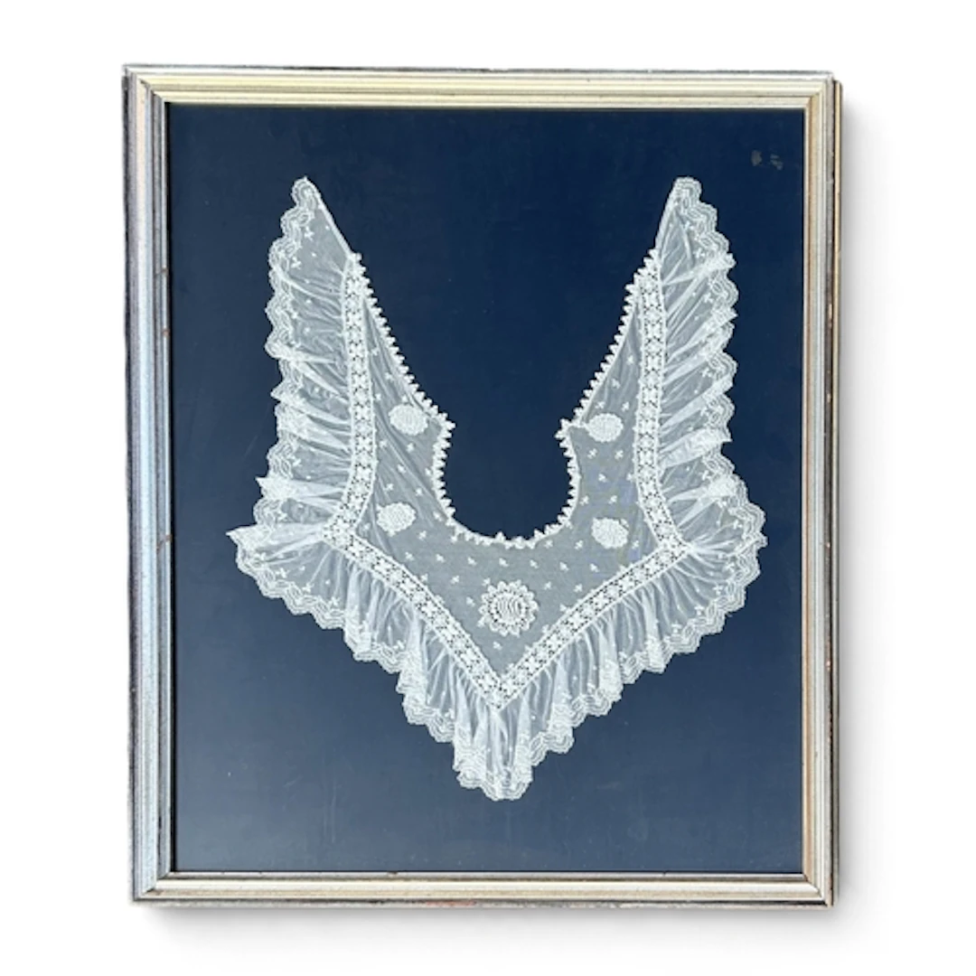 A LARGE ANTIQUE LACEWORK Frame measures 101cm x 85cm. Fram...