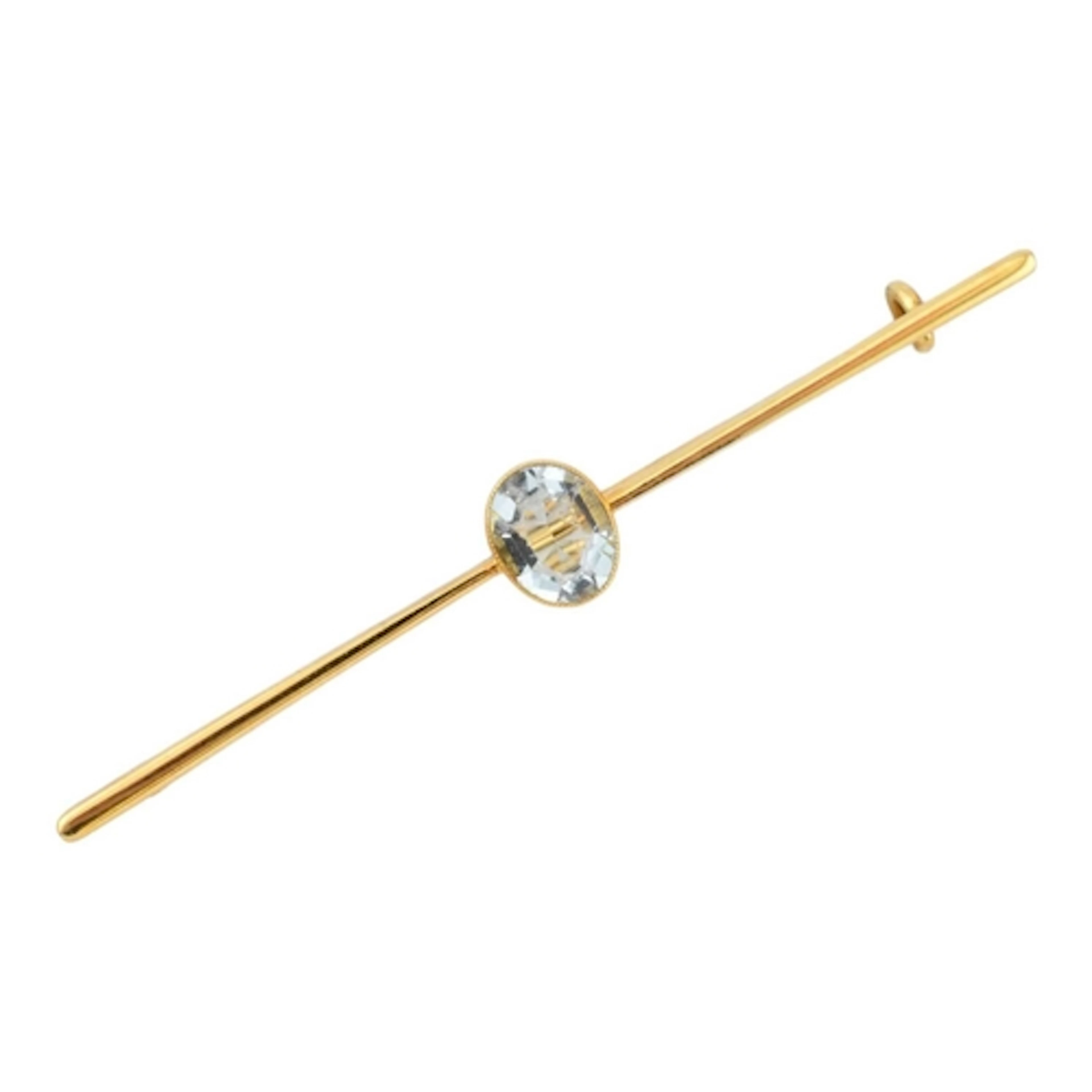An early 20th century 15ct gold gem set brooch pin. The broo...