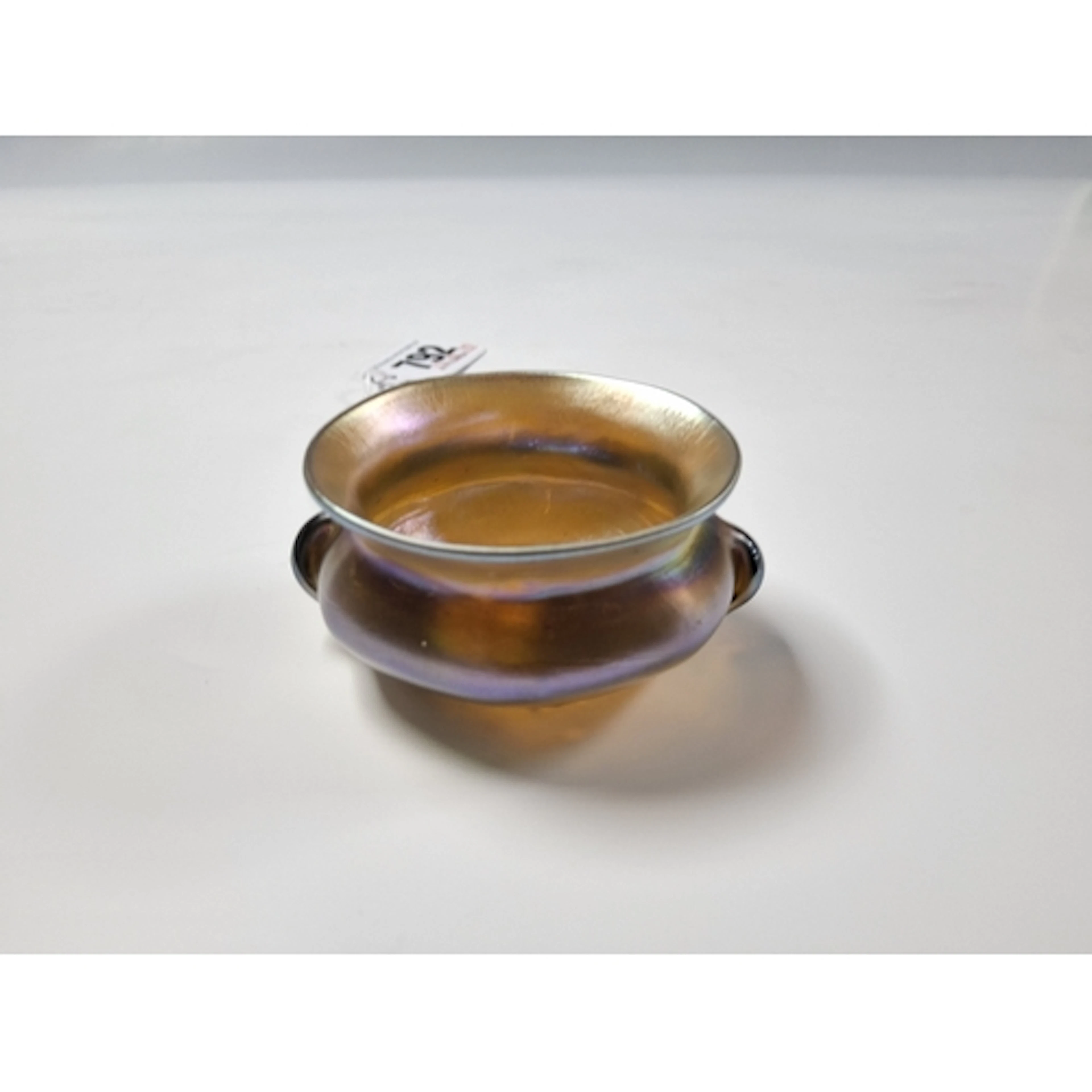 A MINIATURE ART NOUVEAU TIFFANY FAVRILE IRIDESCENT GLASS BOW...